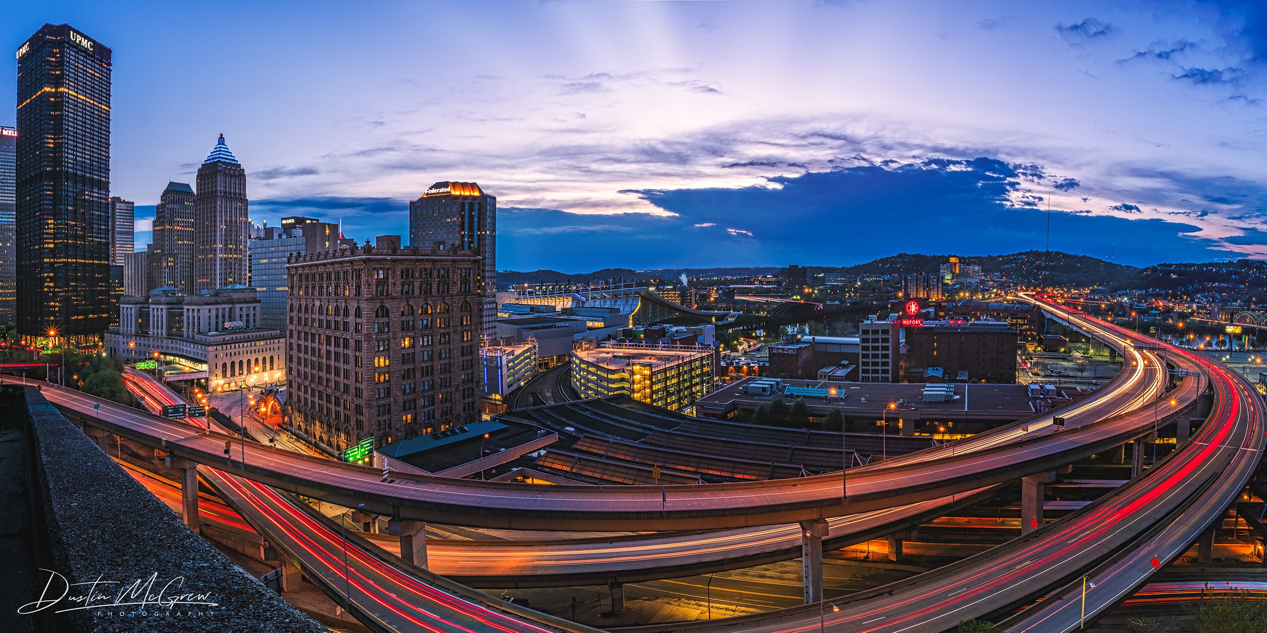 Pittsburgh cityscape with light trails at dusk HD Wallpaper