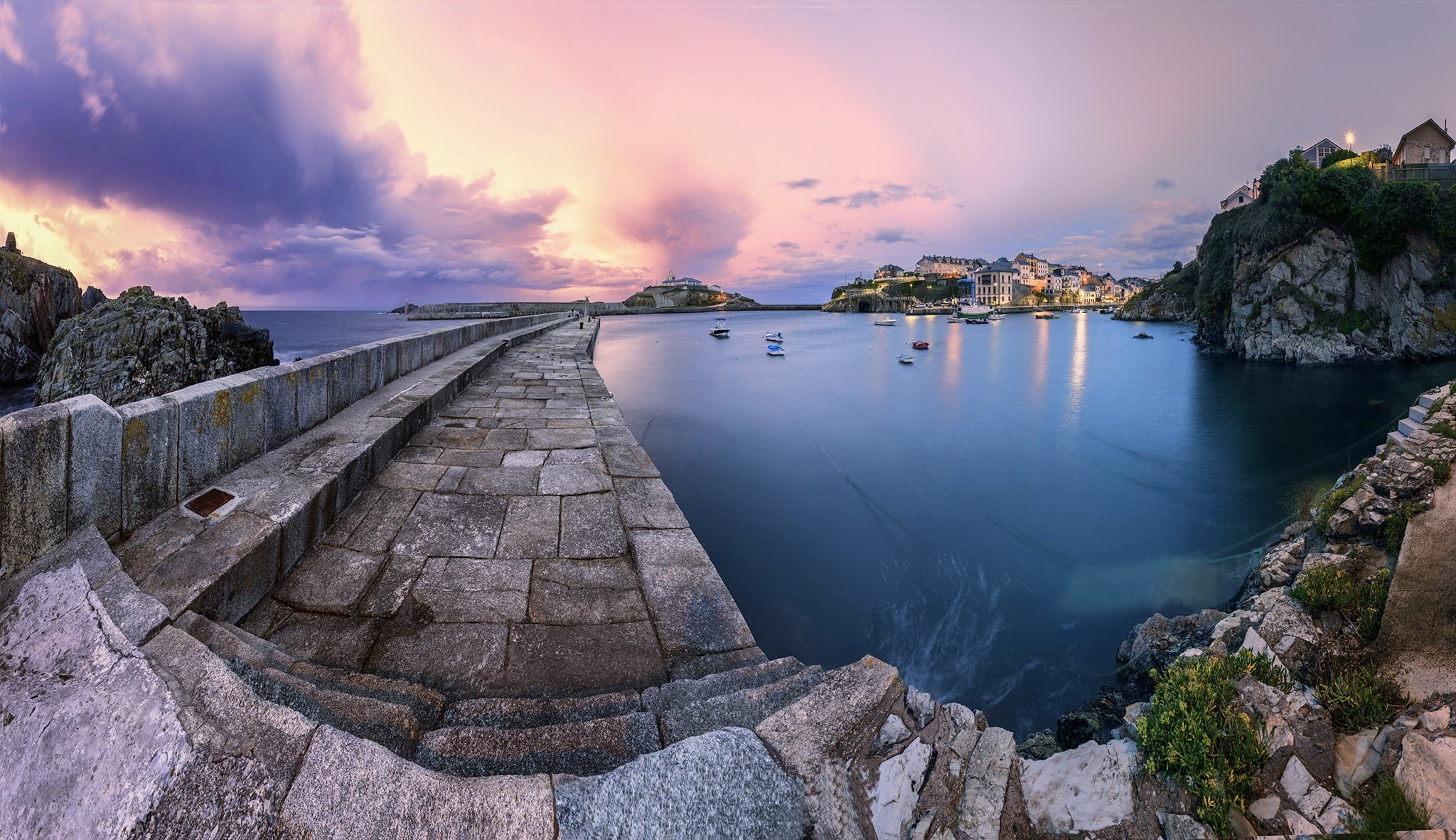 Stone pier and harbor at sunset with colorful clouds HD Wallpaper