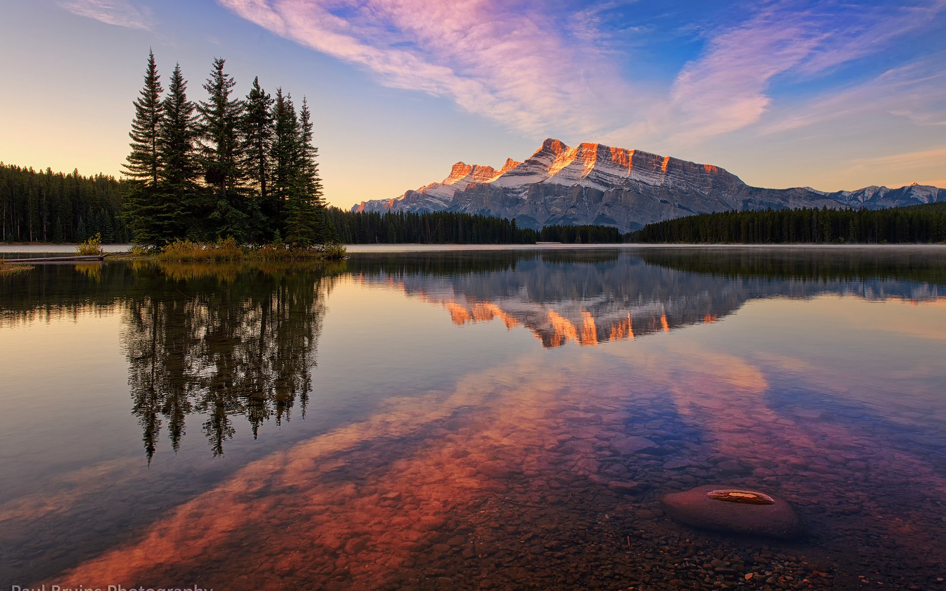 Mountain reflection on a lake at sunrise HD Wallpaper