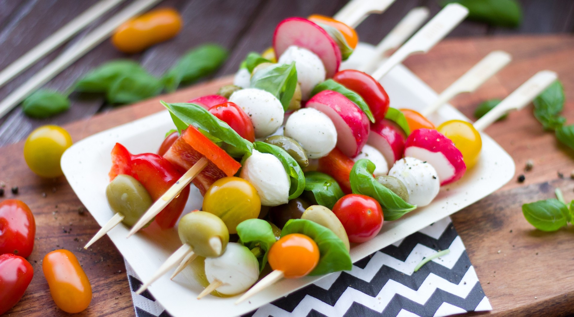 Caprese skewers with cherry tomatoes, mozzarella, and basil HD Wallpaper
