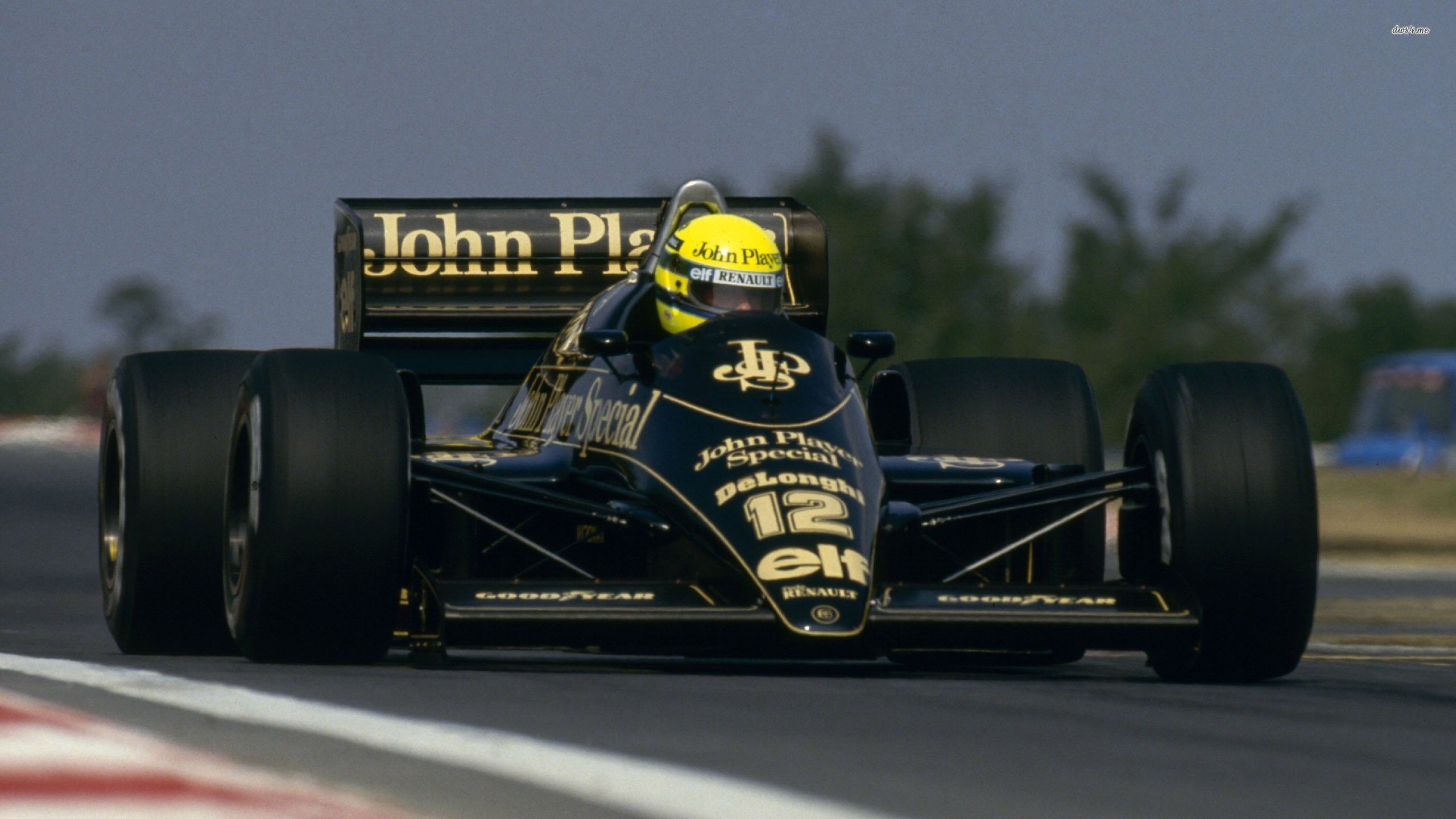Ayrton Senna driving a Lotus Formula 1 car HD Wallpaper
