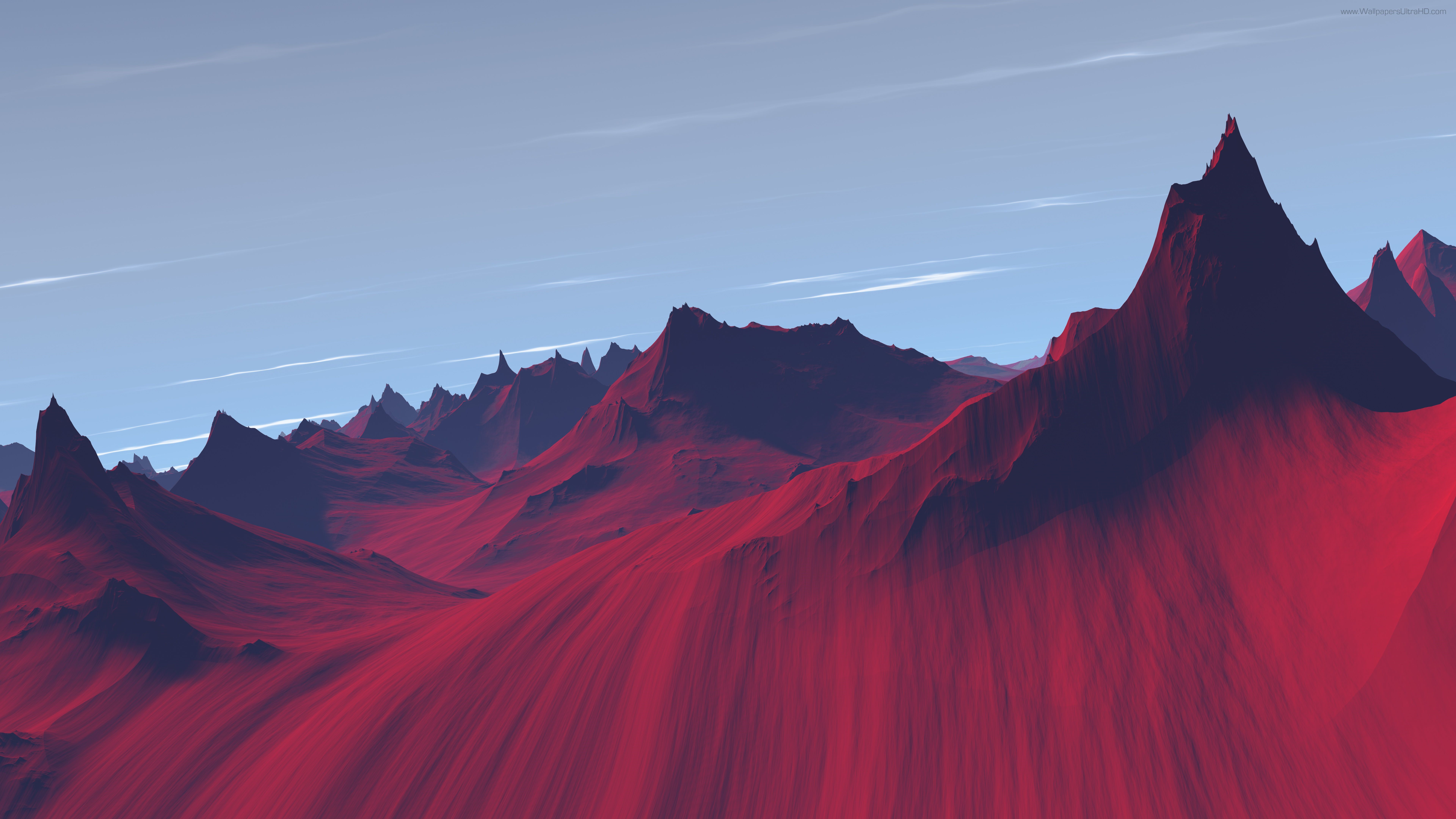 Red mountains under a pale blue sky with clouds HD Wallpaper