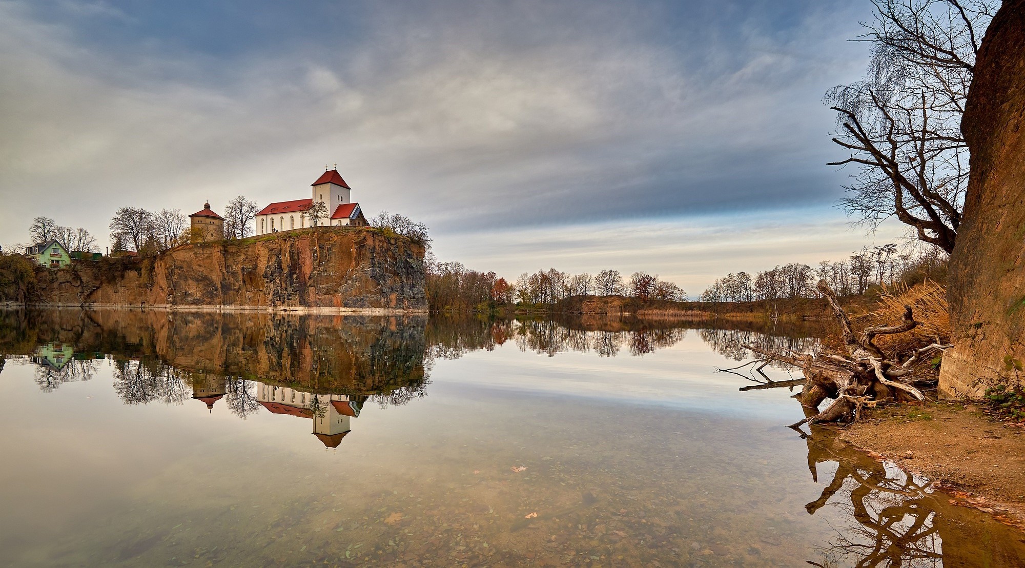 Church on a cliff overlooking a lake in Germany HD Wallpaper
