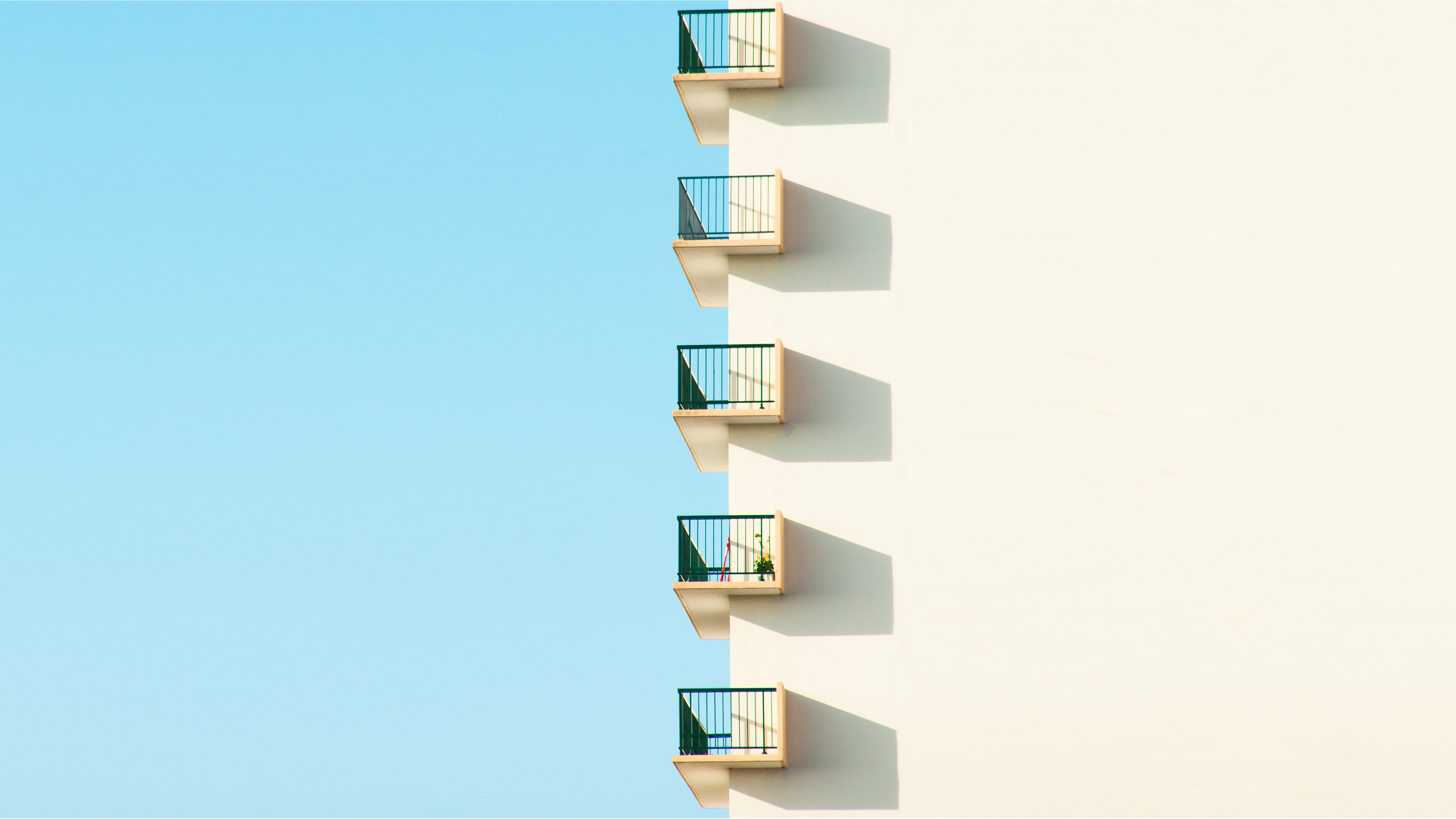 Balconies on a building by Matthieu Venot HD Wallpaper