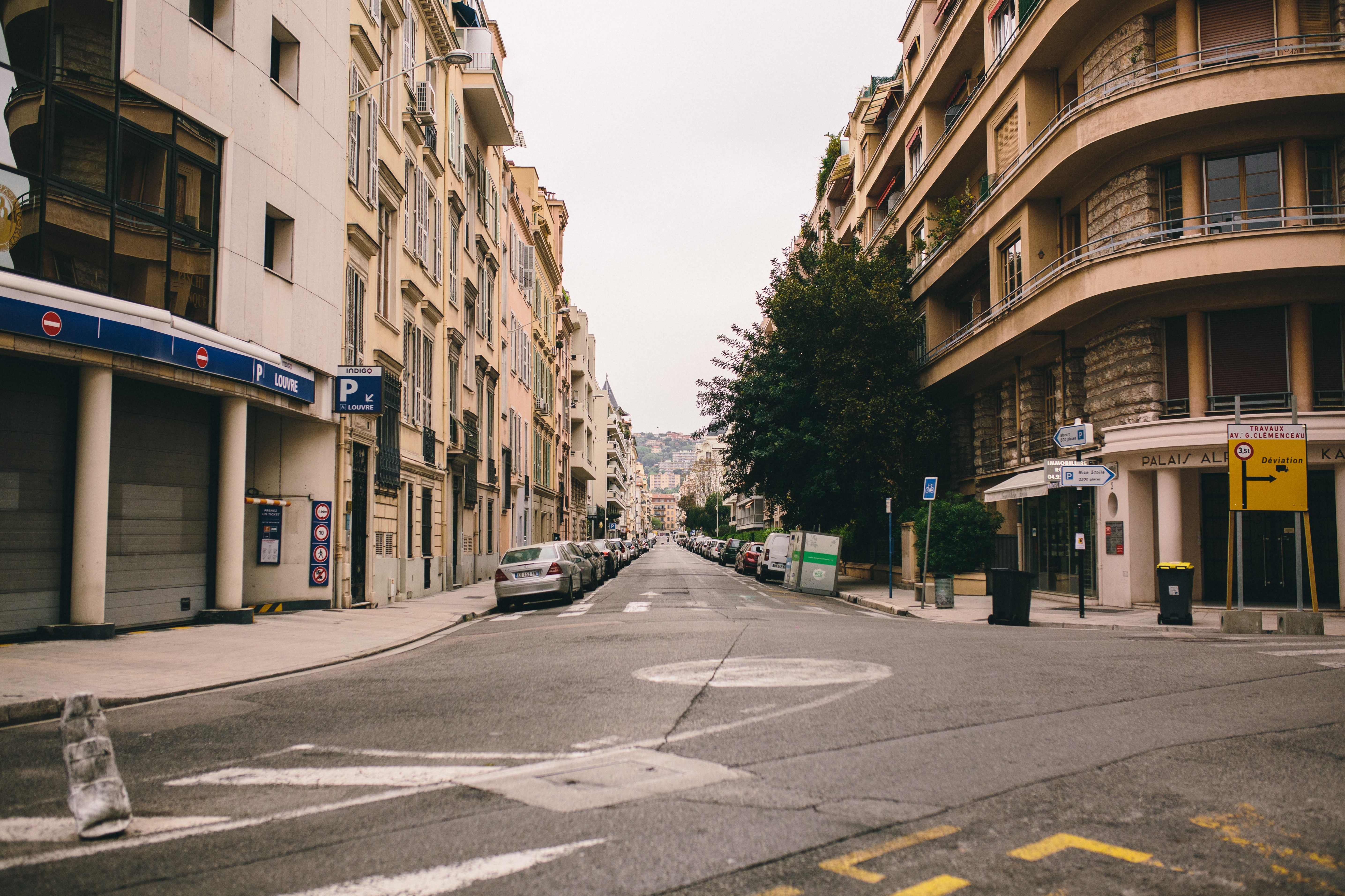Street view in Nice, France with buildings and cars HD Wallpaper