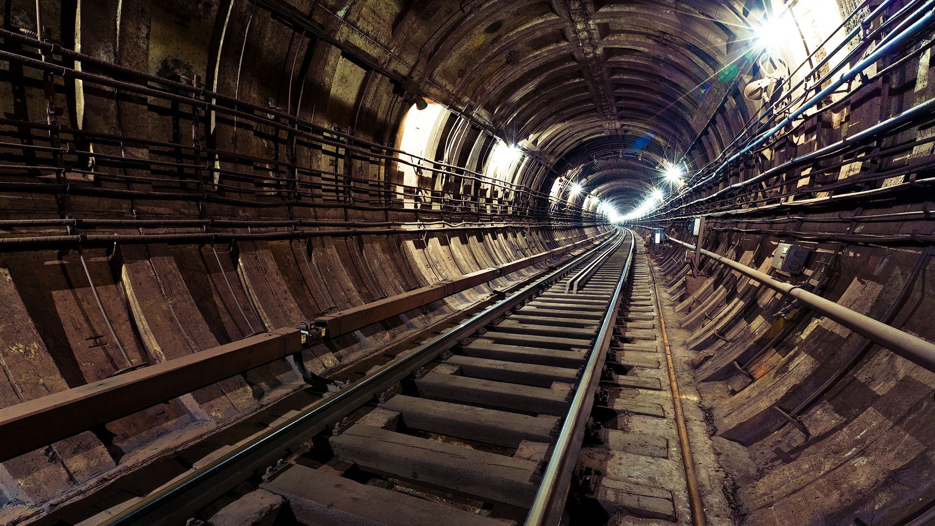 Empty subway tunnel with railway tracks HD Wallpaper