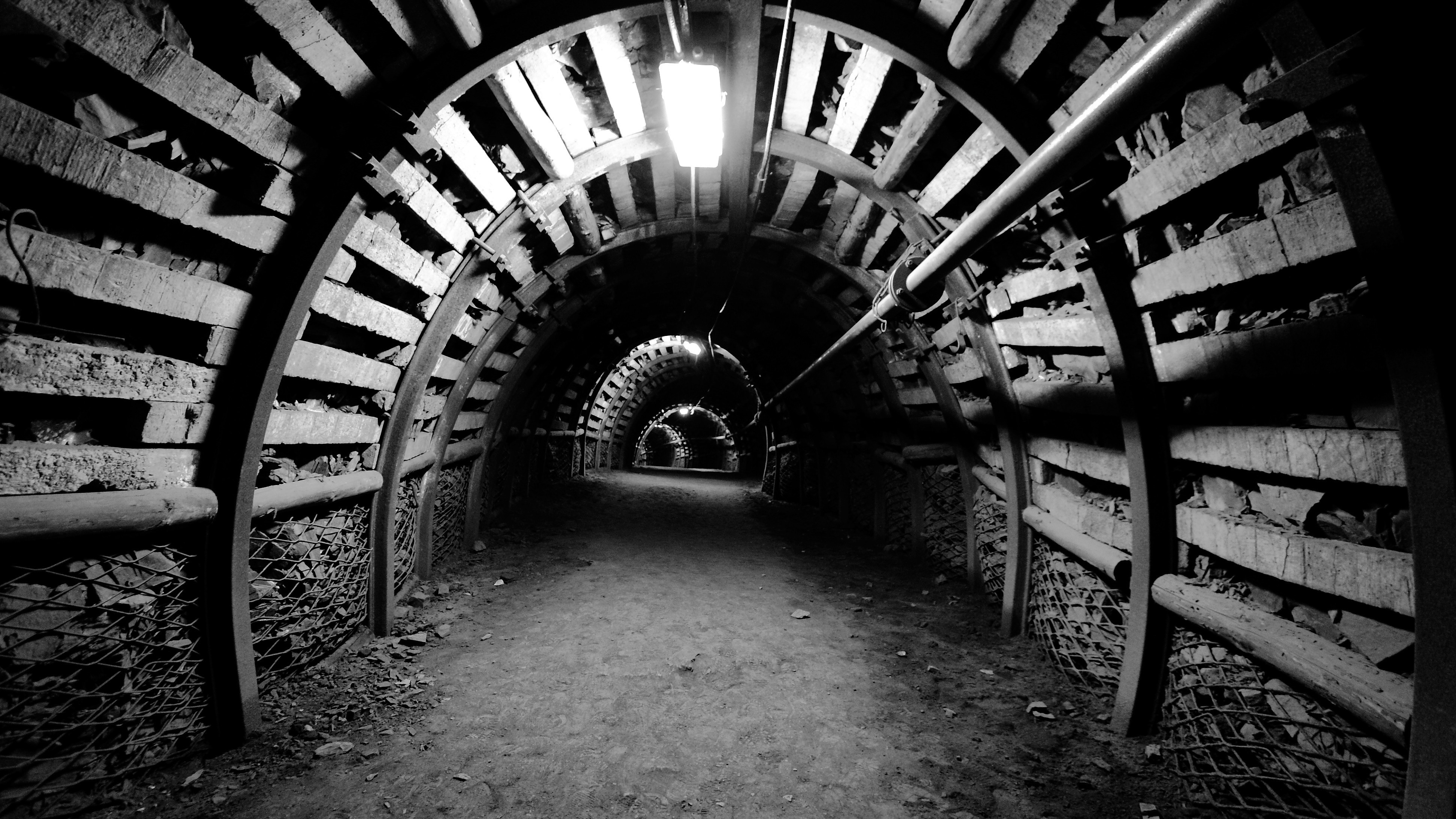 Abandoned monochrome mine tunnel underground HD Wallpaper