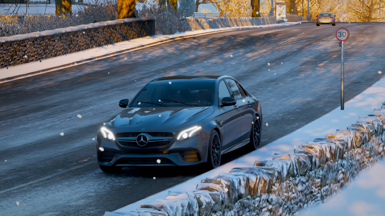 Mercedes-AMG E63 S driving on a snowy road in Forza Horizon 4 HD Wallpaper