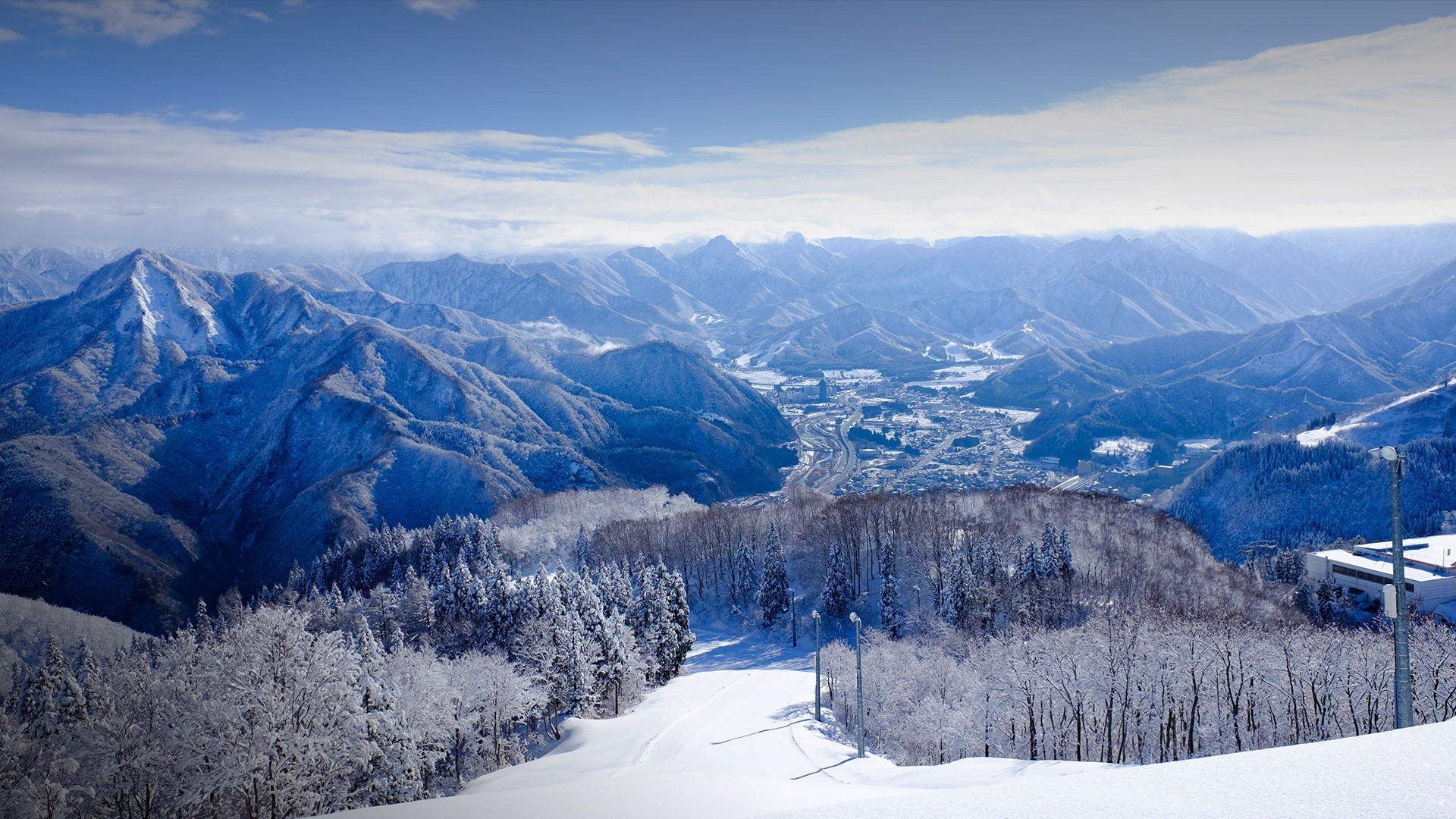 Snowy mountains and valley town in Japan HD Wallpaper