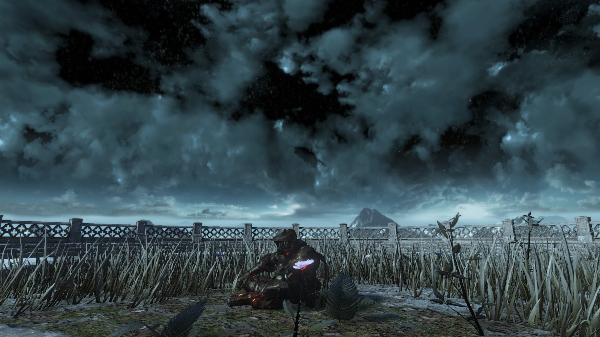 Dark Souls 3 character sitting in grass under stormy sky HD Wallpaper