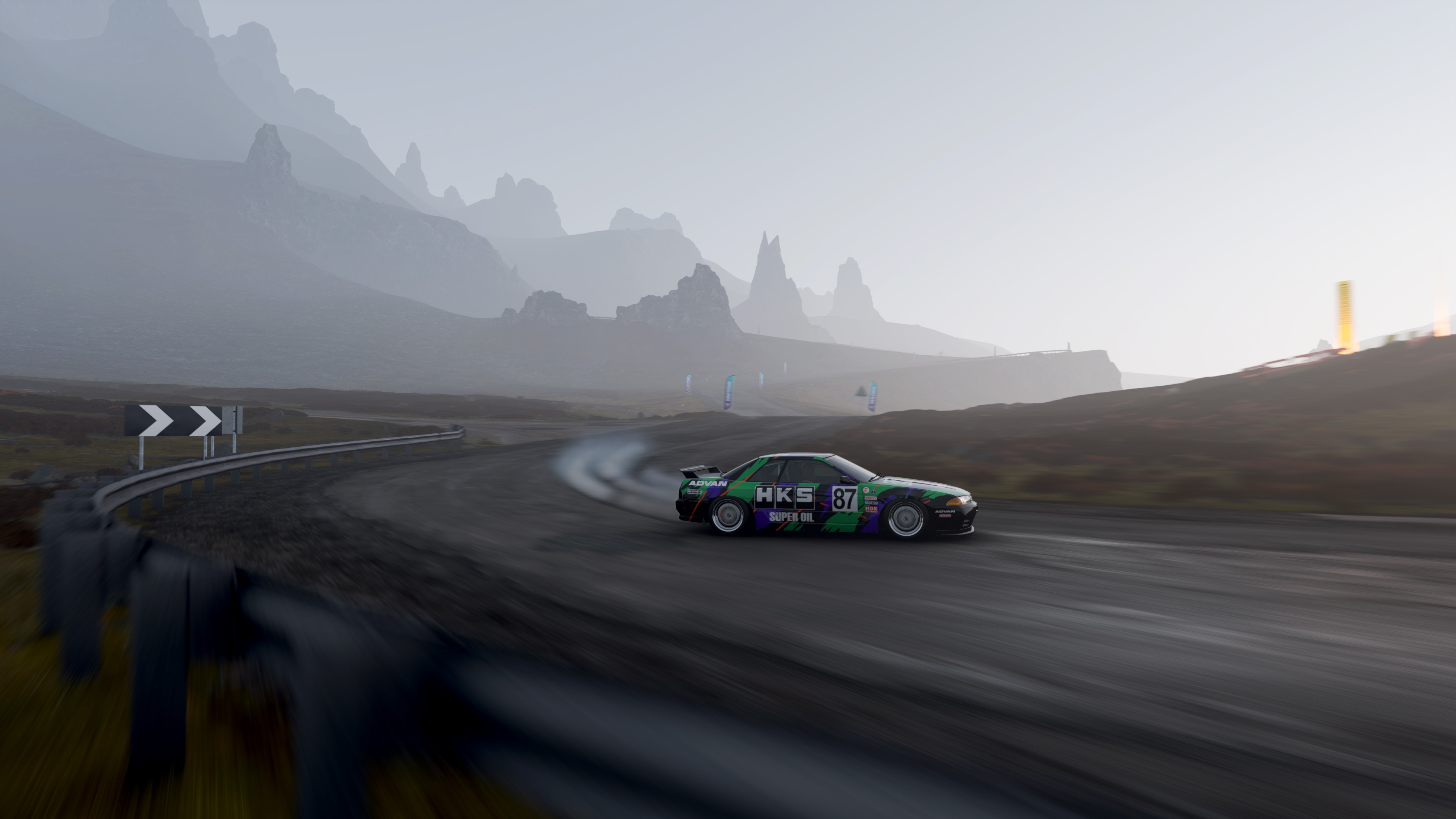 Nissan Skyline R32 drifting on a foggy road HD Wallpaper
