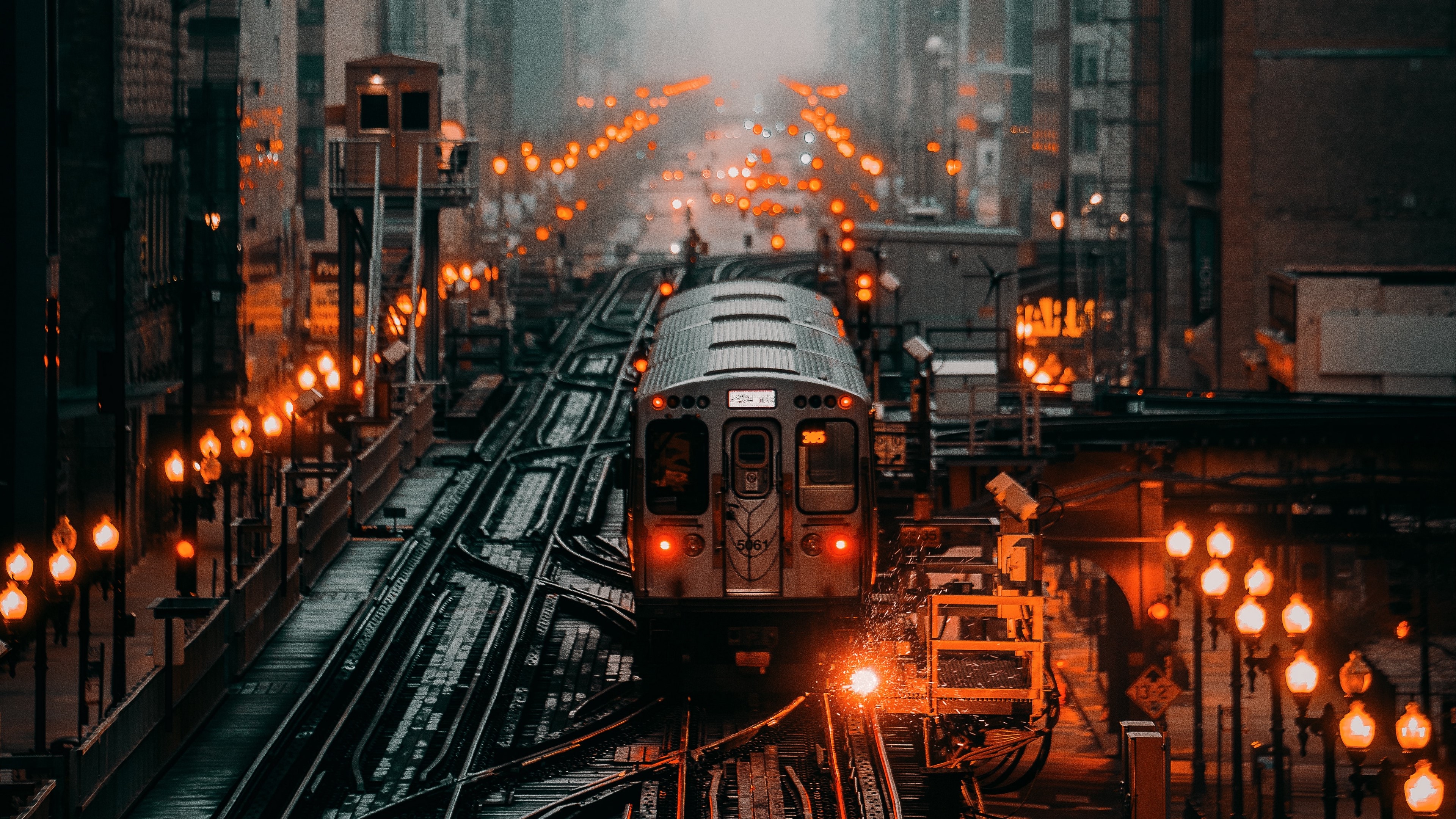 4K Elevated Train in City at Night HD Wallpaper