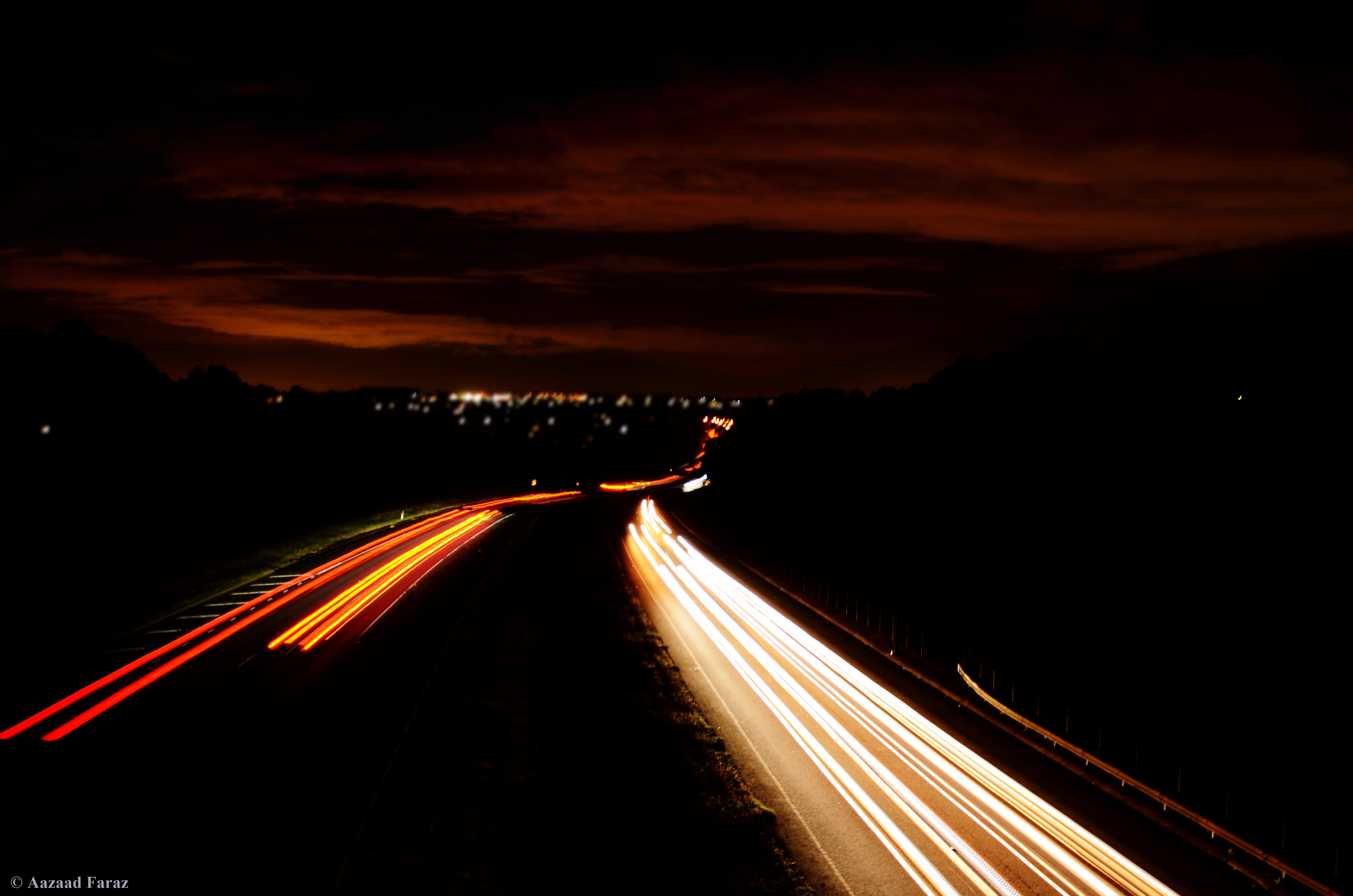 Long exposure of a highway at night HD Wallpaper