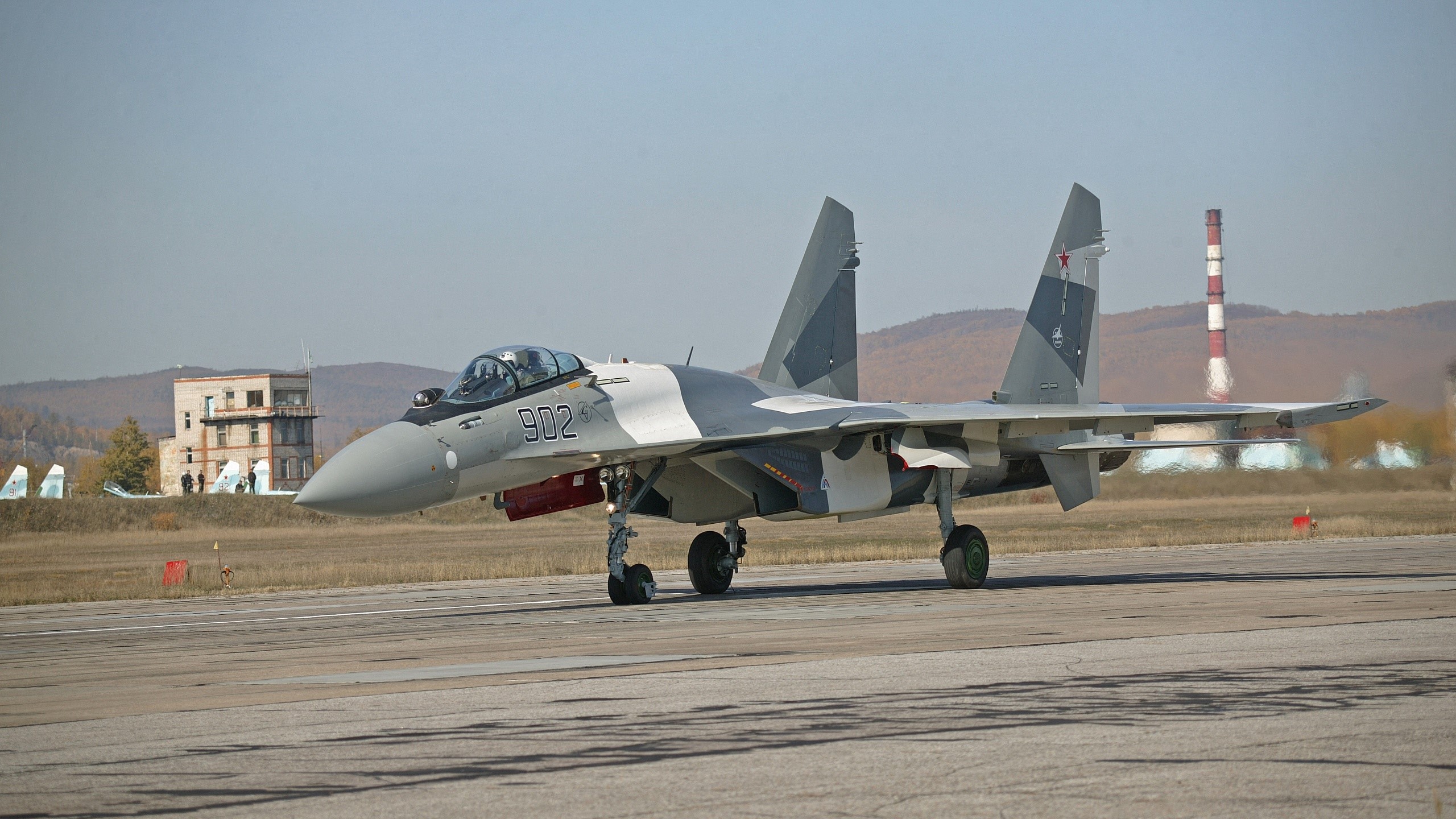 Sukhoi Su-35 fighter jet on a runway in Russia HD Wallpaper