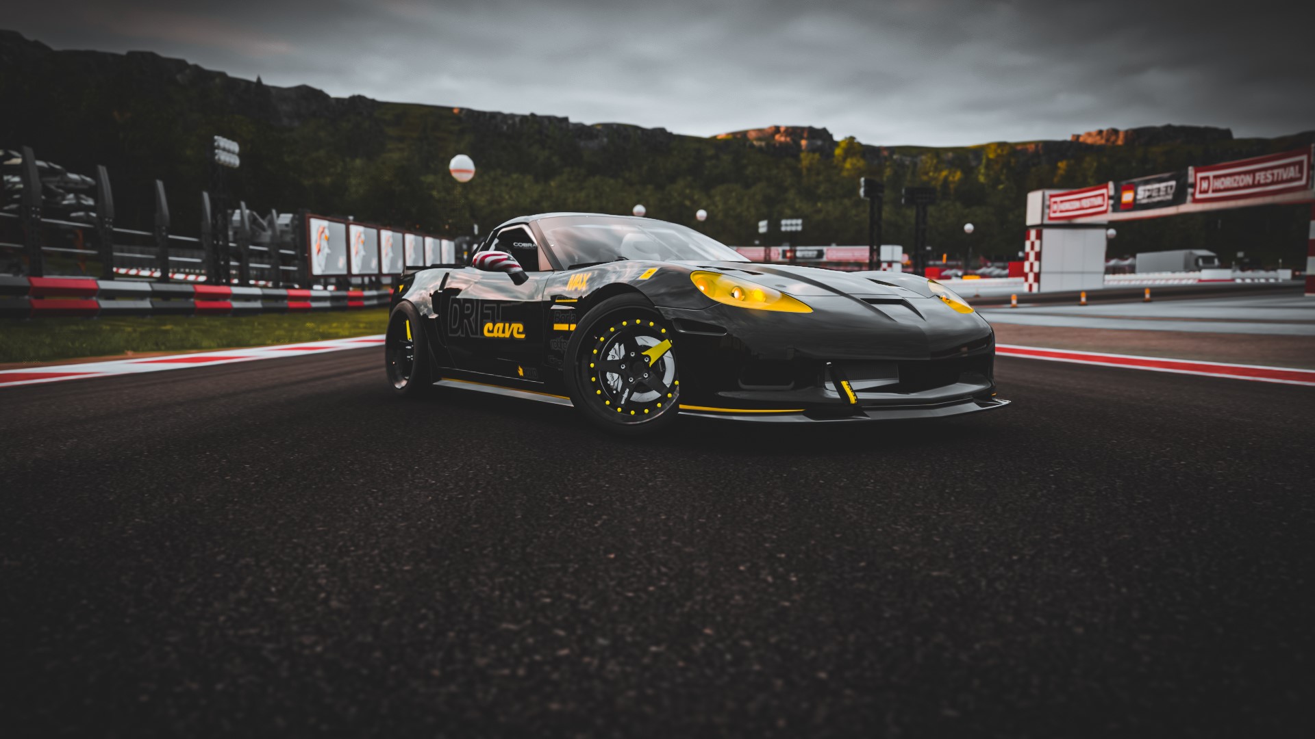 Black Chevrolet Corvette C6 on a race track HD Wallpaper