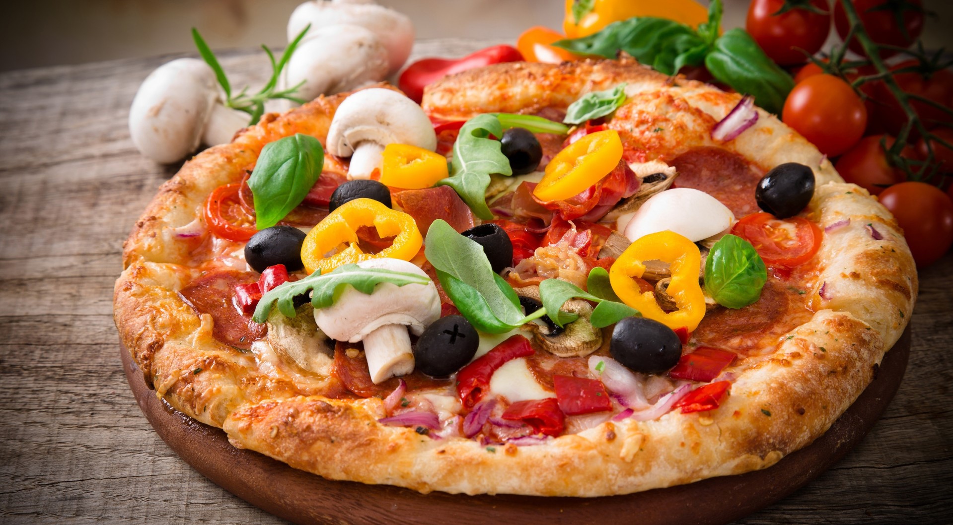 Delicious pizza with fresh vegetables and olives HD Wallpaper