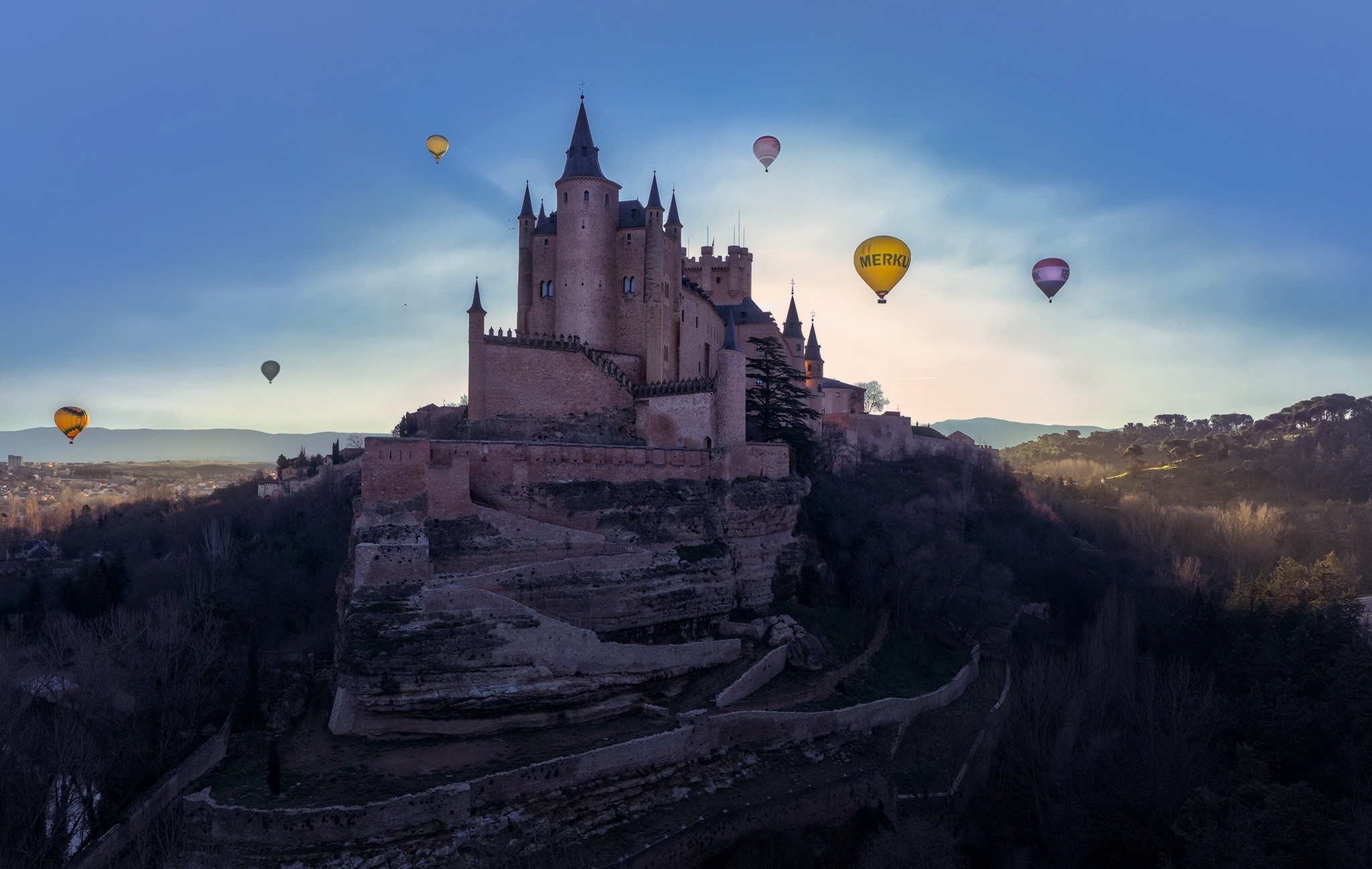 Castle Alcázar of Segovia with hot air balloons HD Wallpaper