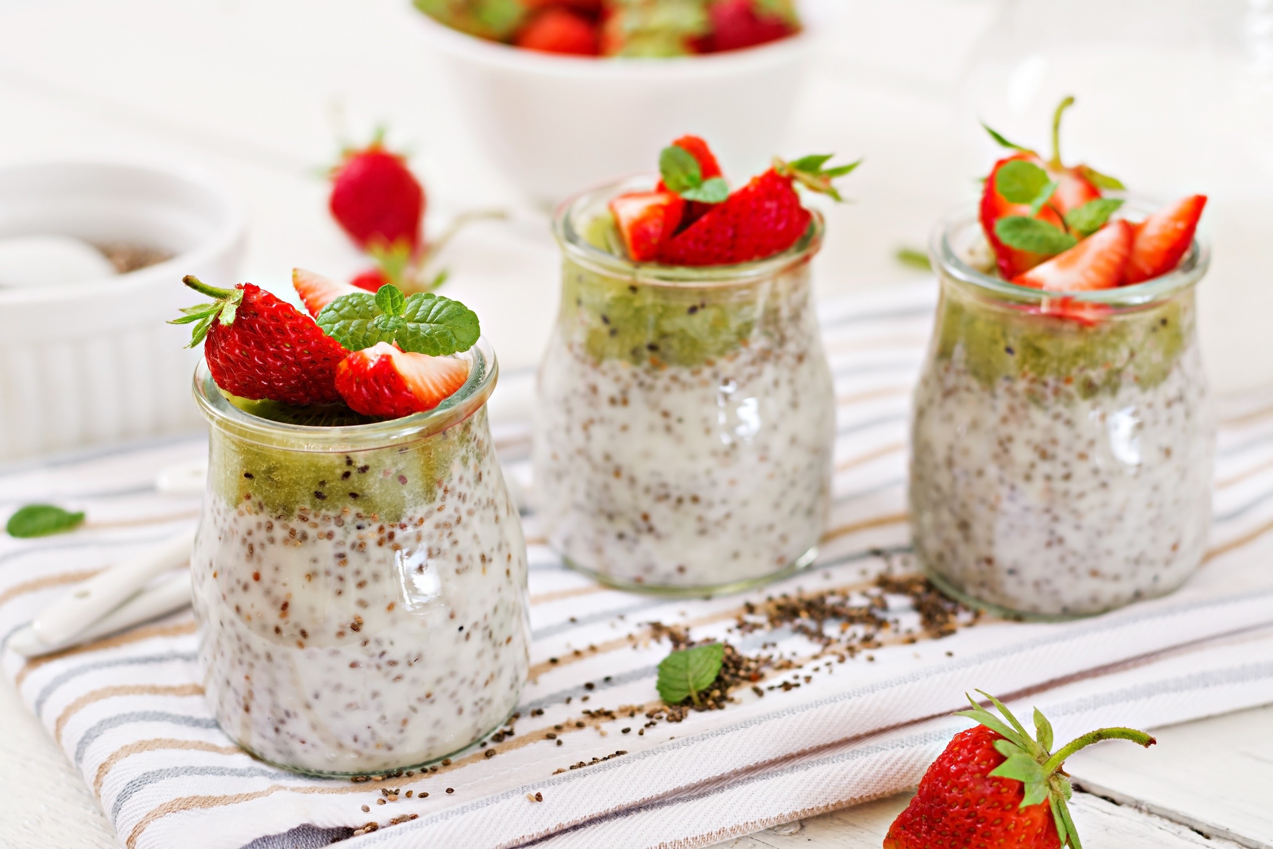 Chia seed pudding with kiwi and strawberries HD Wallpaper