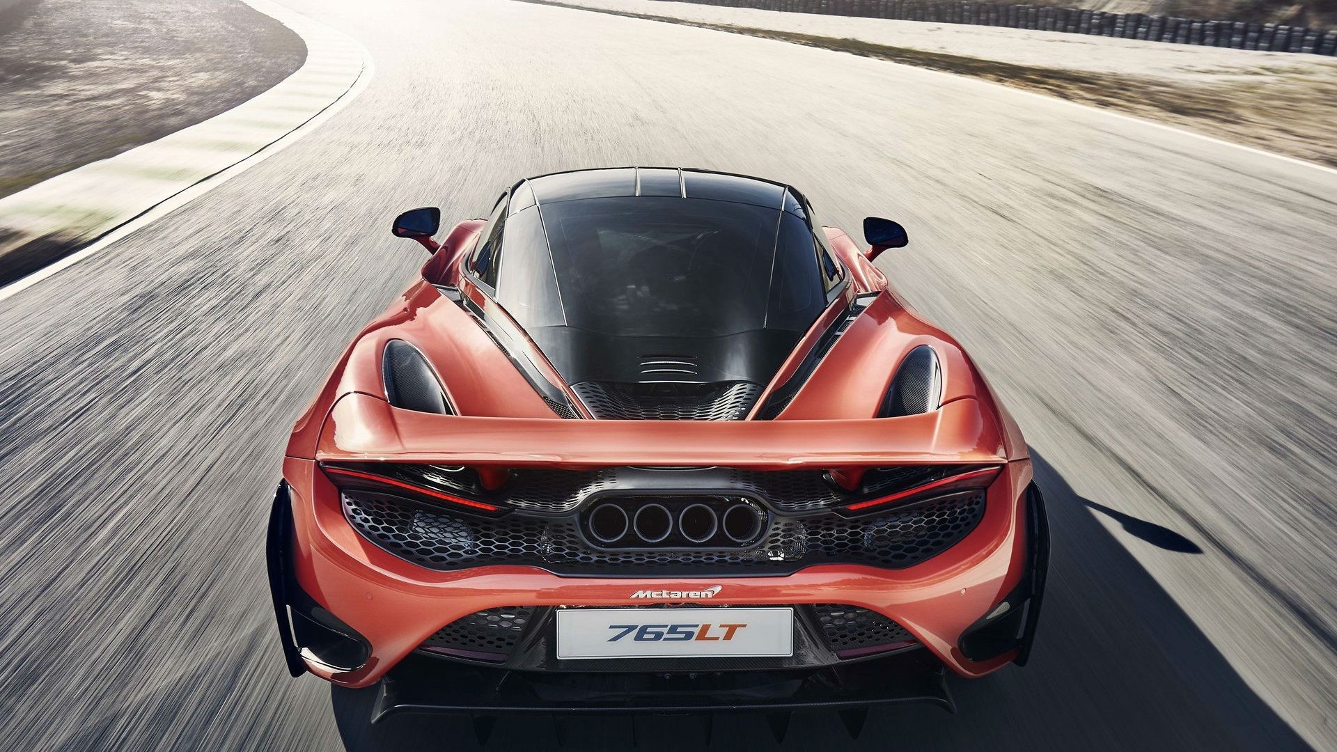McLaren 765LT Supercar on a Racetrack HD Wallpaper