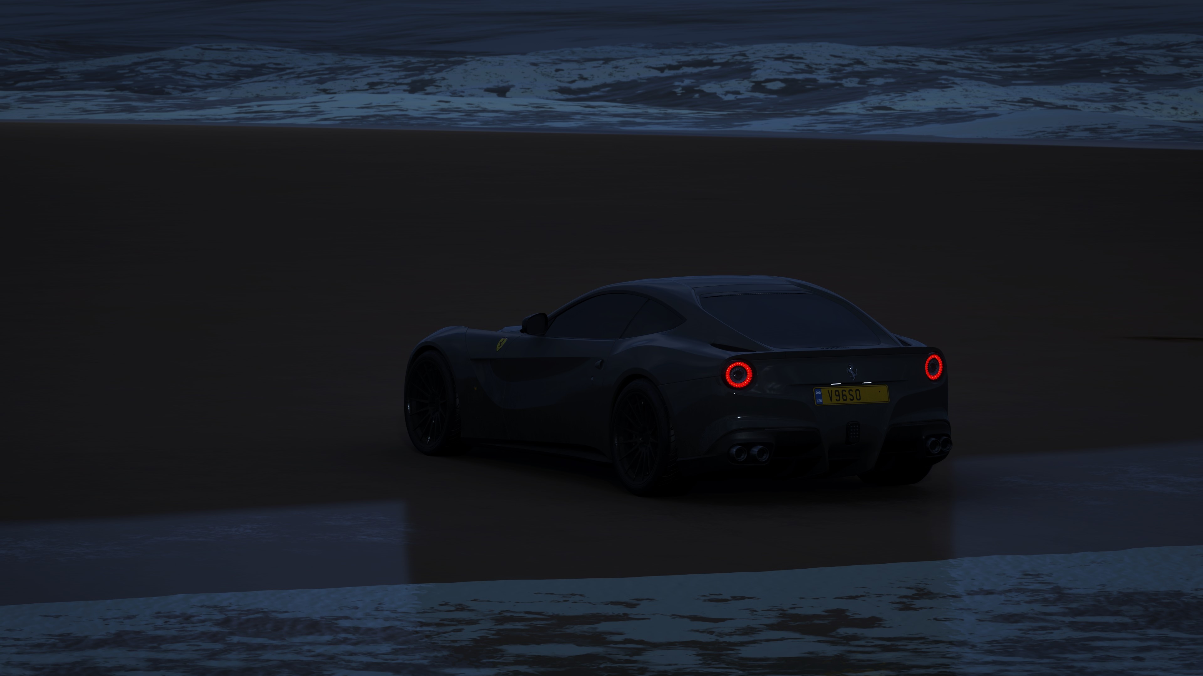 Dark Ferrari F12berlinetta on a beach at night HD Wallpaper