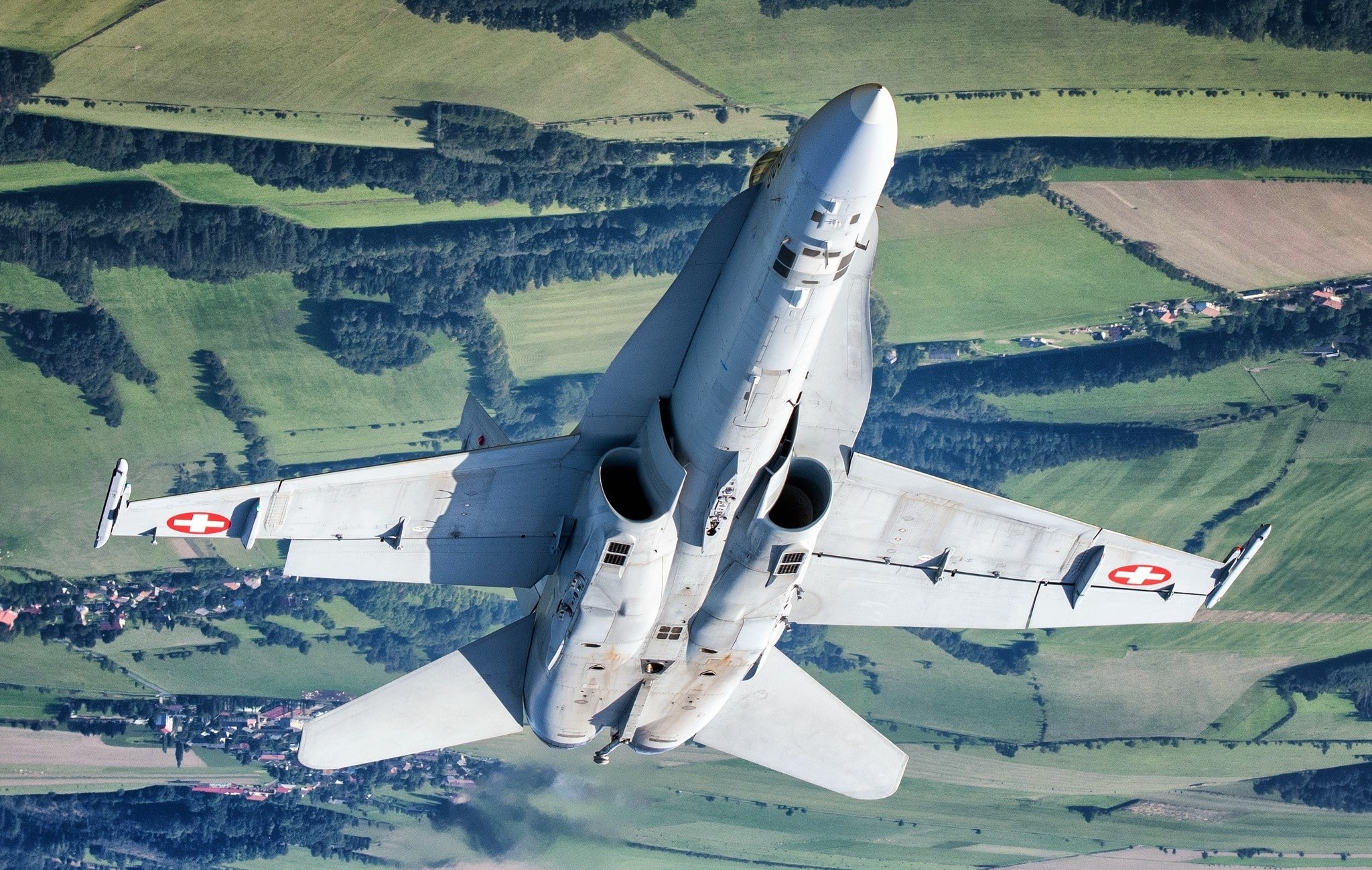 Swiss Air Force F/A-18 Hornet flying upside down HD Wallpaper