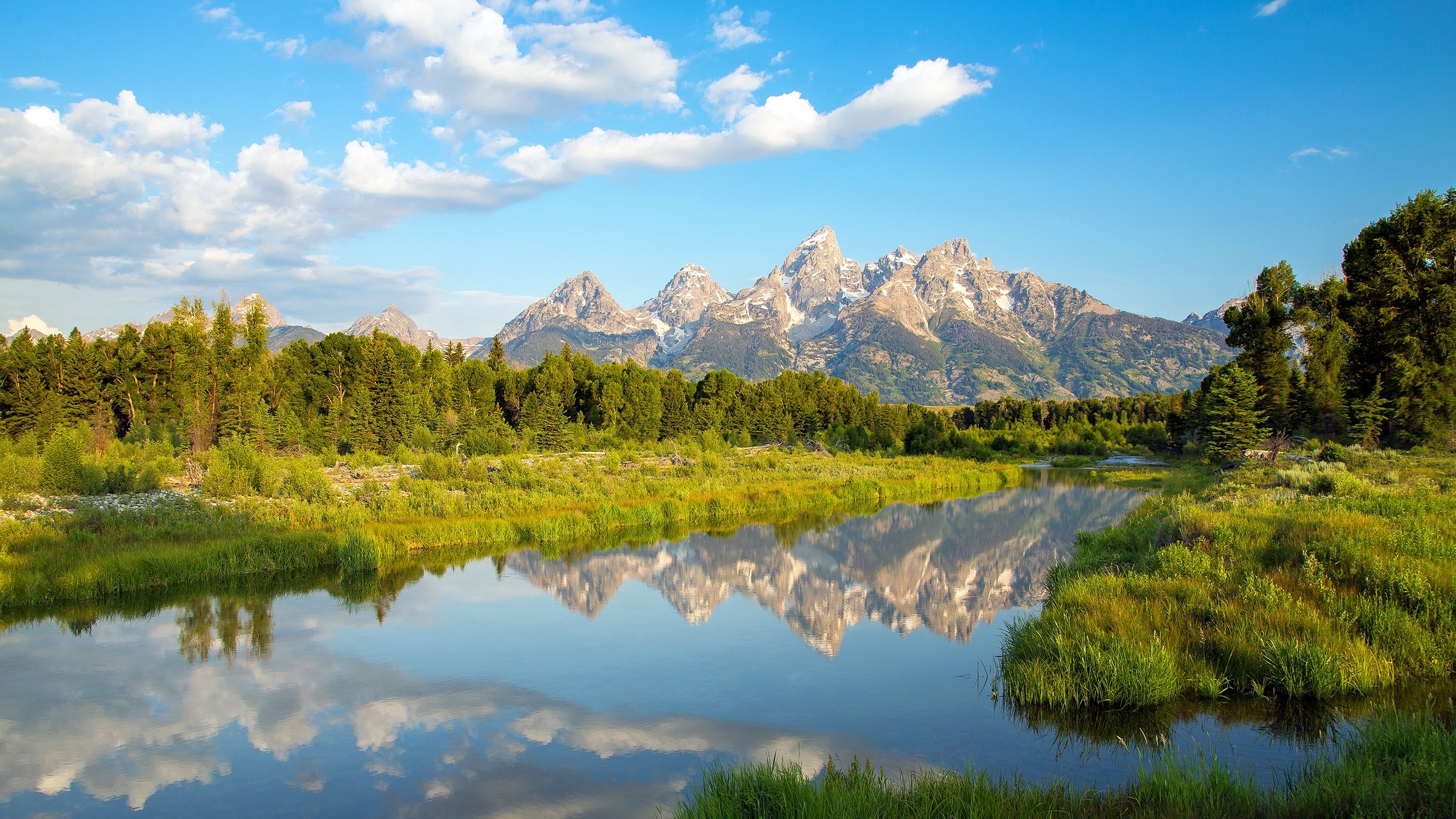 Grand Teton Mountains reflected in a river HD Wallpaper
