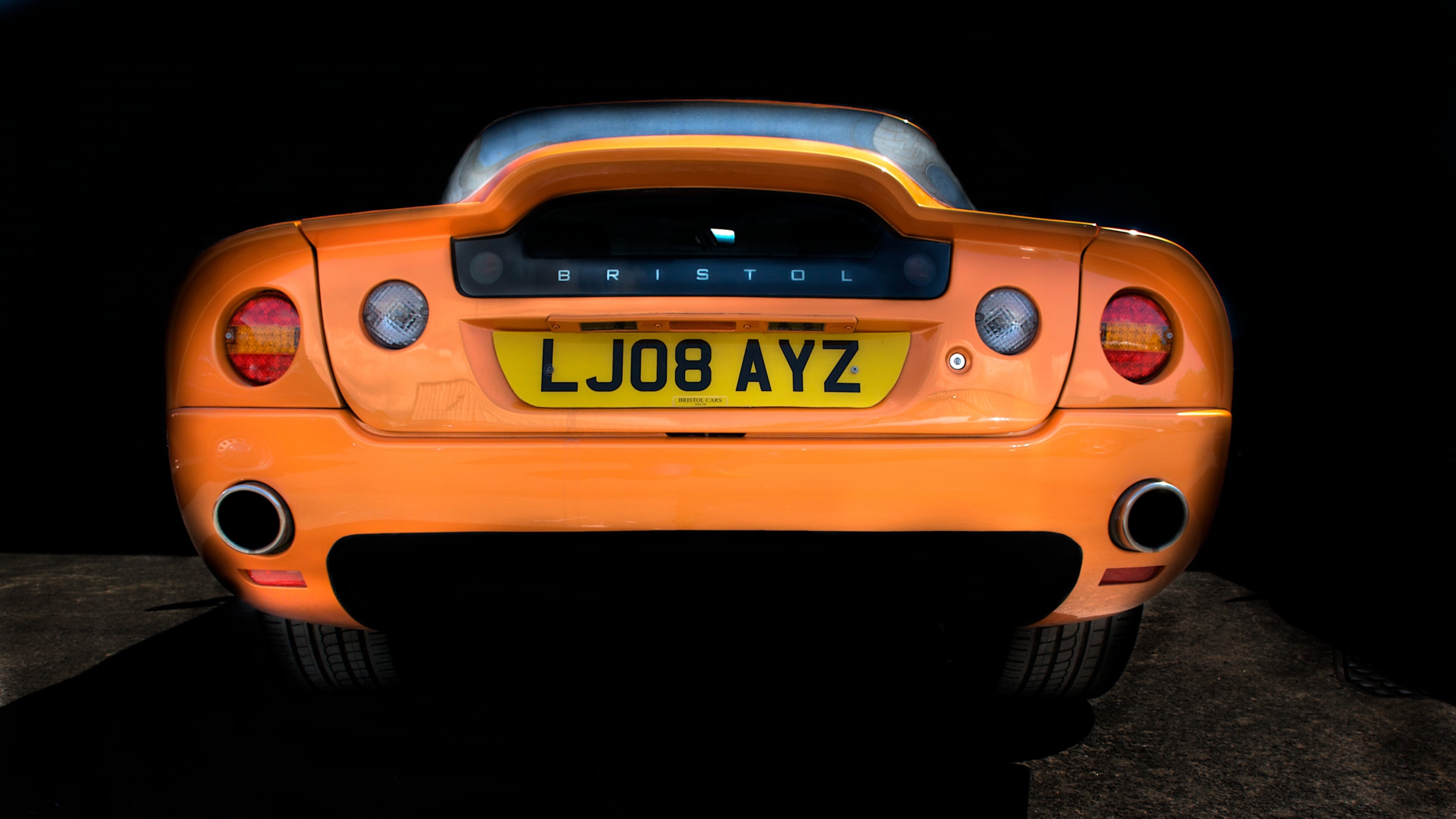 Orange Bristol sports car with license plate LJ08 AYZ HD Wallpaper