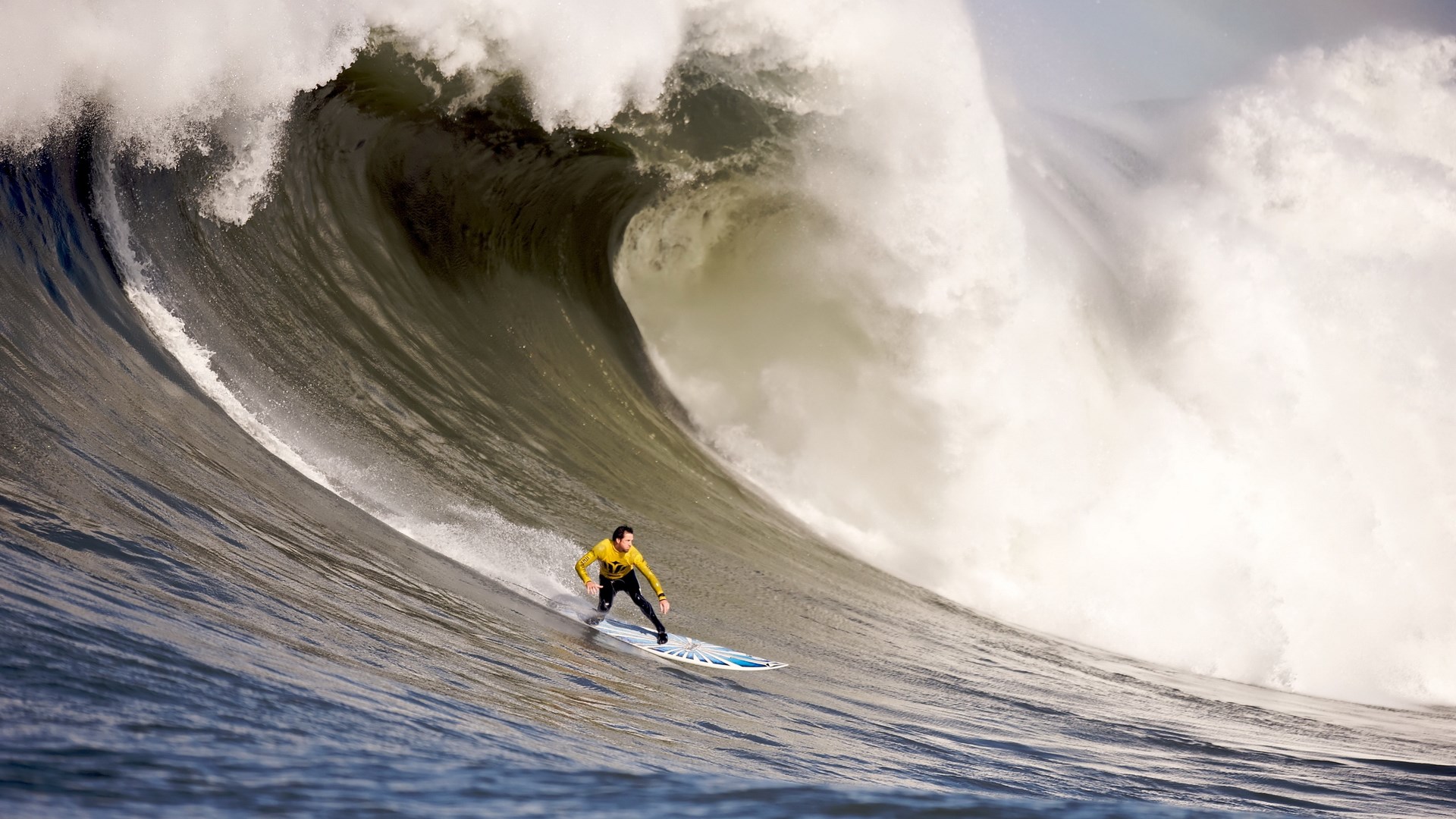 Surfer riding a giant wave HD Wallpaper