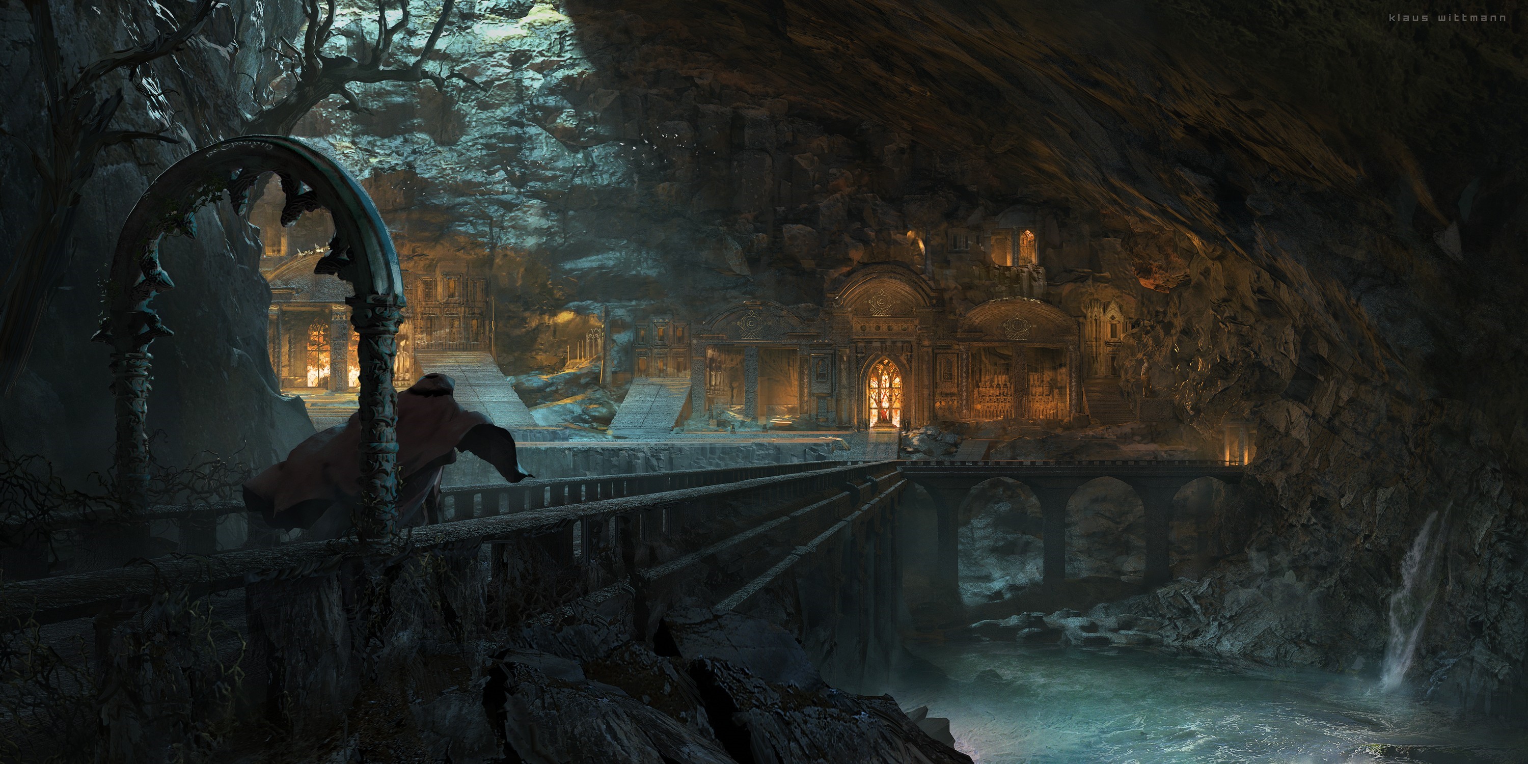 Fantasy cave dwelling with a figure on a bridge HD Wallpaper
