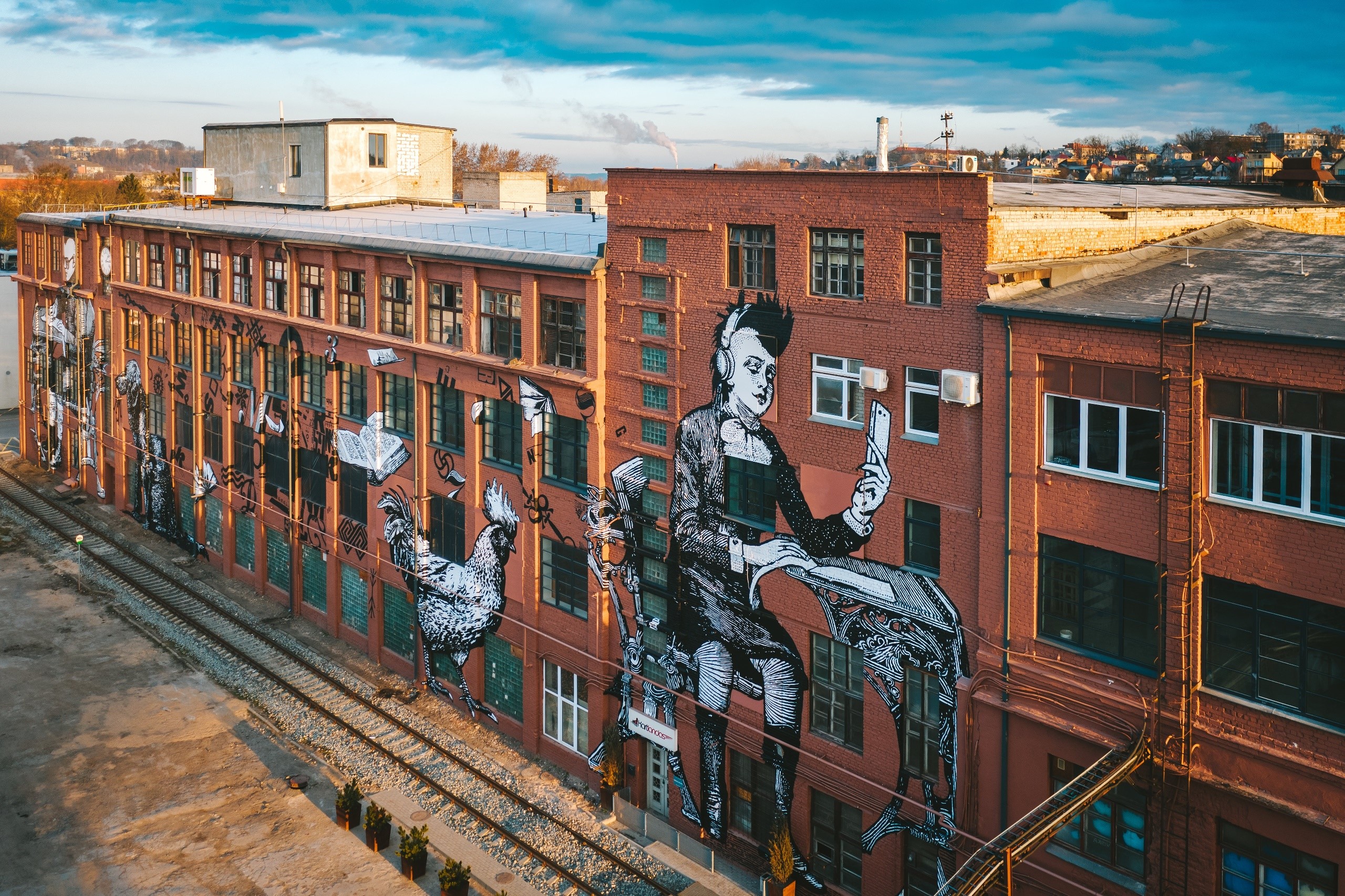 Graffiti on a brick building in Kaunas HD Wallpaper