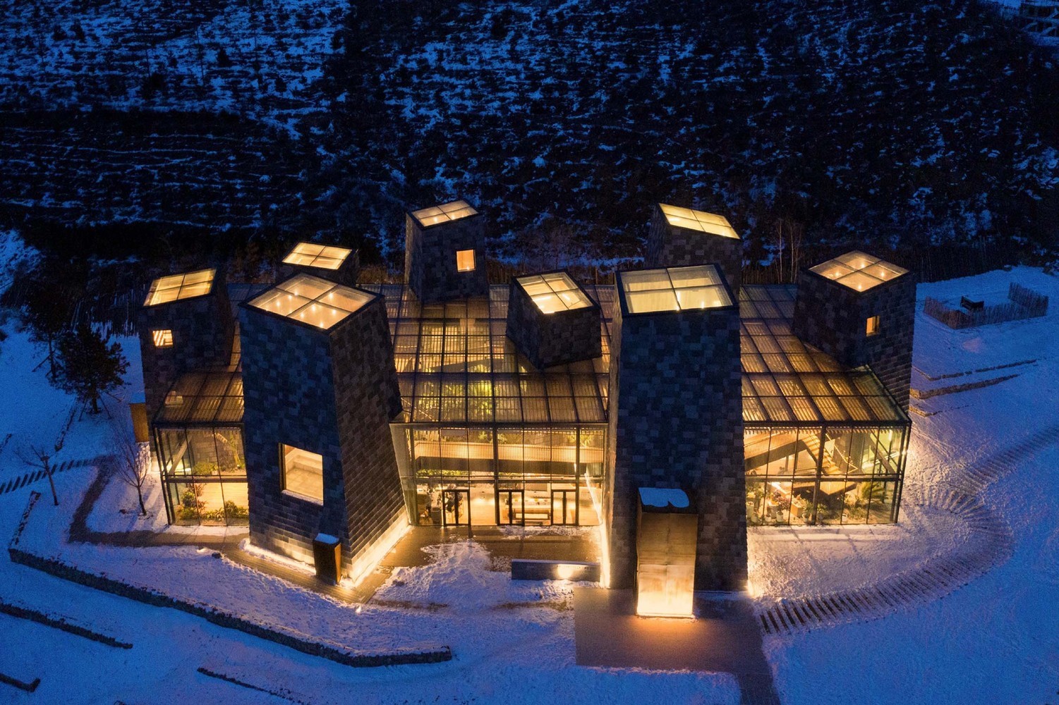 Modern architecture building with glass roof at night HD Wallpaper