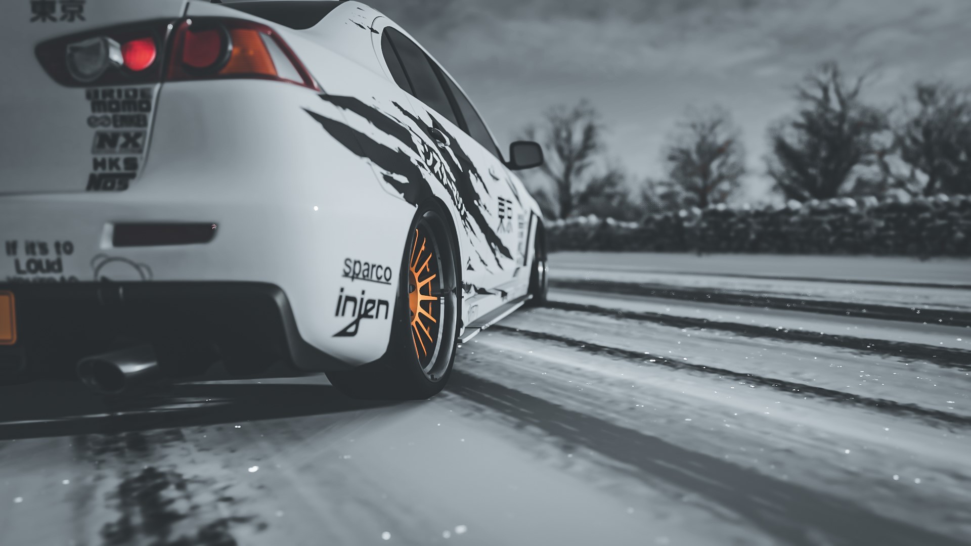 Mitsubishi Lancer Evo X with orange wheels in snow HD Wallpaper