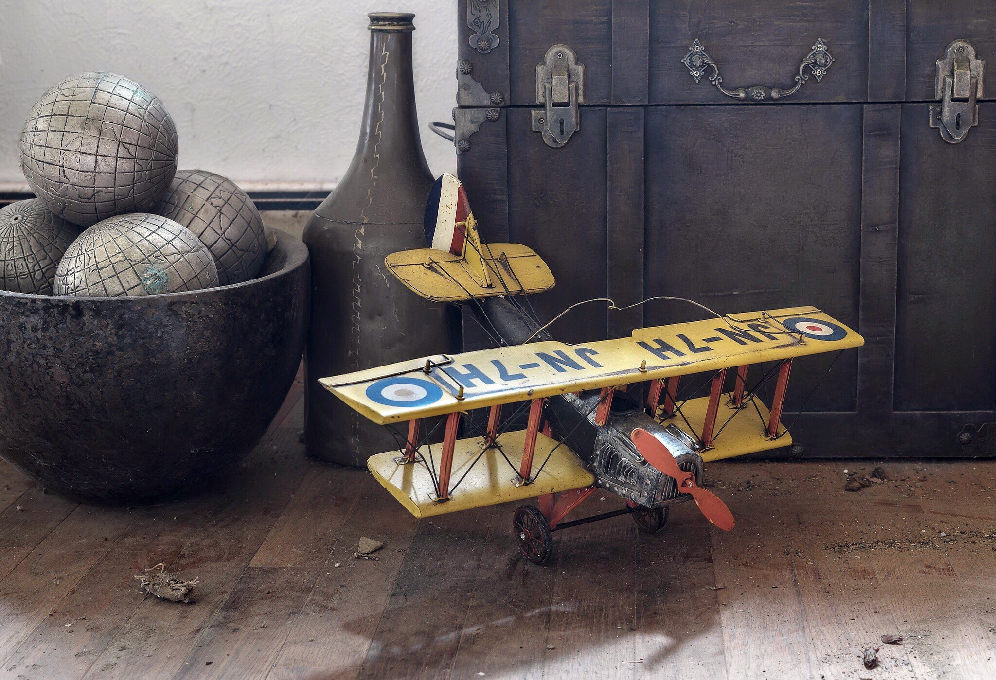 Vintage toy biplane and bocce balls HD Wallpaper