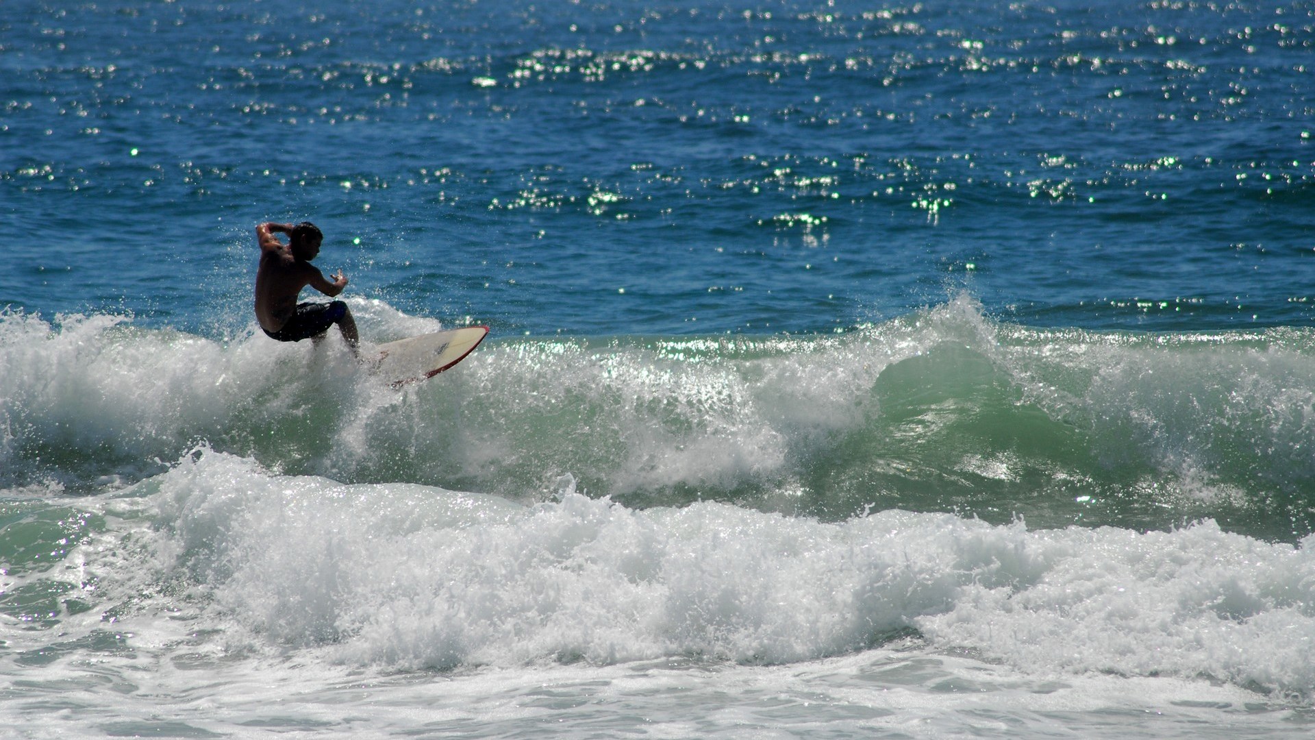 Surfer riding a wave HD Wallpaper