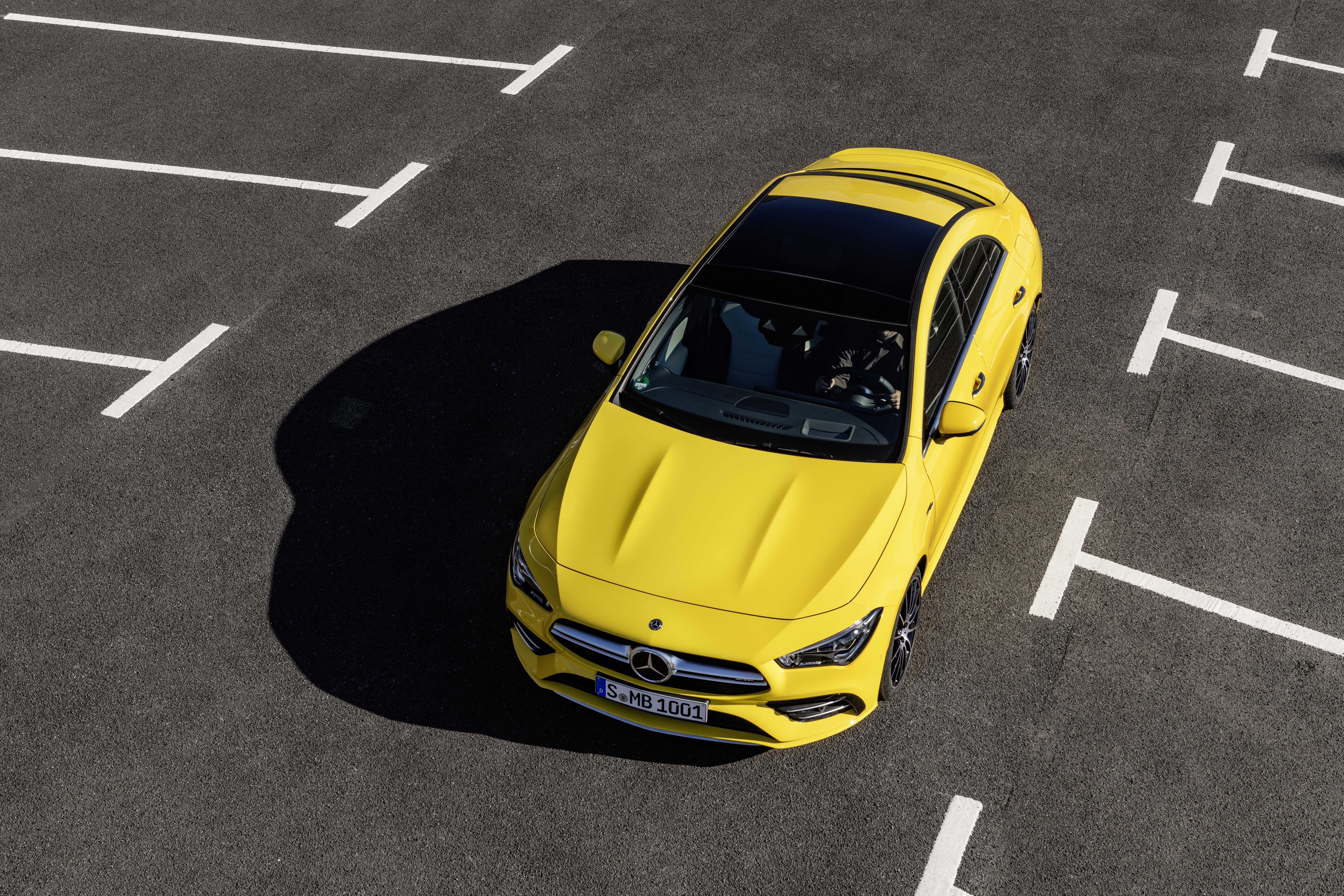 4K Mercedes-Benz CLA parked in a lot HD Wallpaper