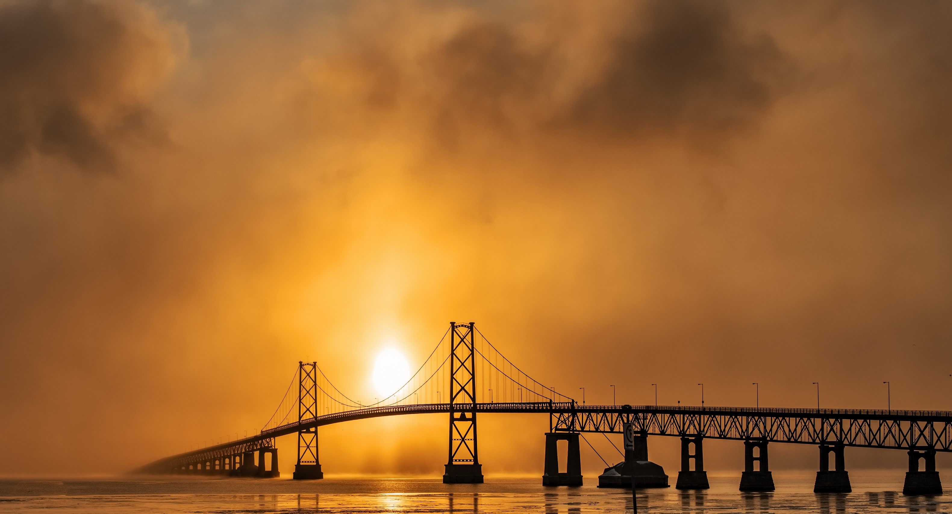 Bridge in fog at sunrise HD Wallpaper