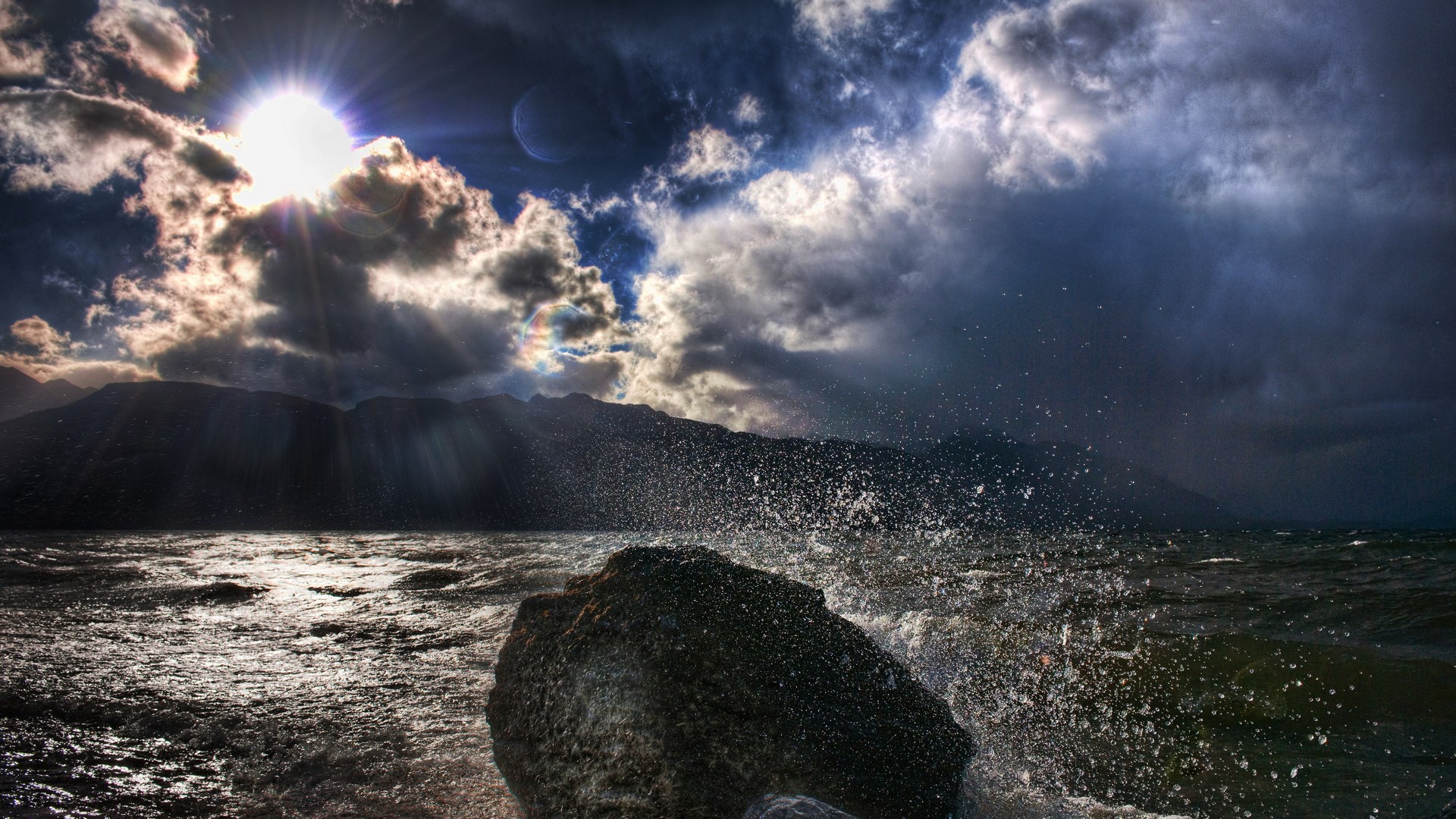 Stormy Sky Over Rocky Shoreline with Waves HD Wallpaper