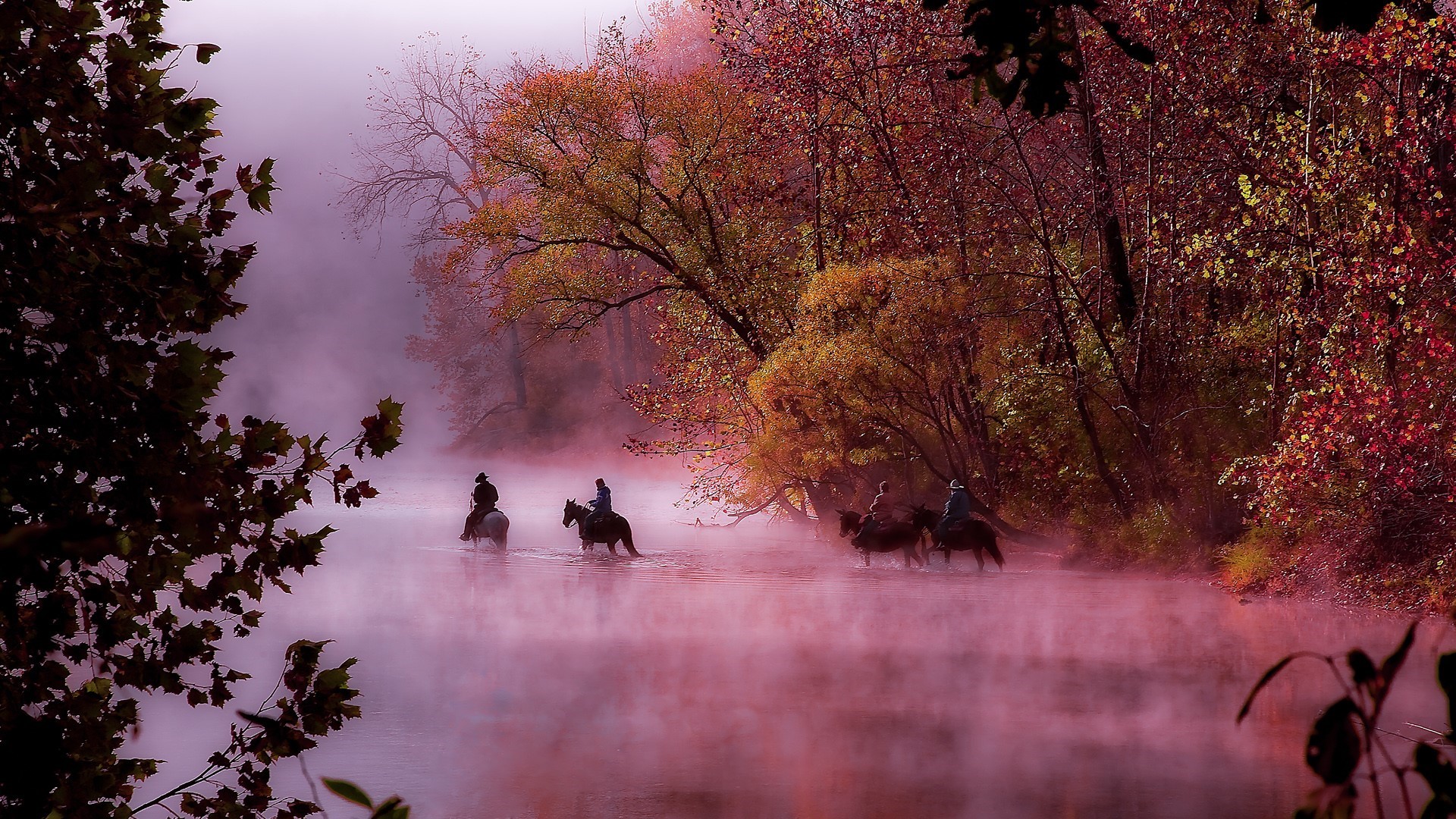 Horsemen crossing a misty river in autumn HD Wallpaper
