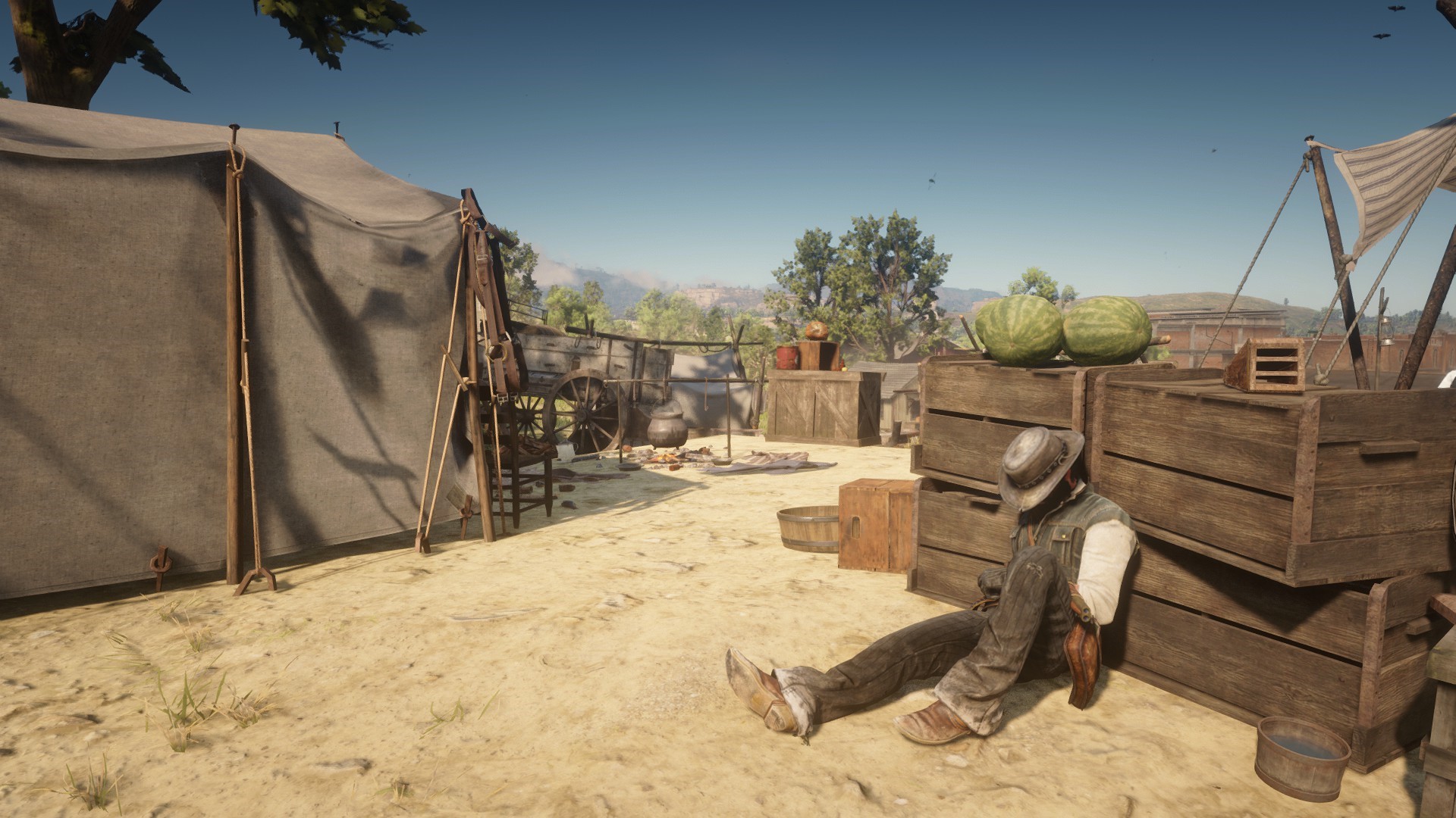 John Marston from Red Dead Redemption 2 resting at a camp HD Wallpaper