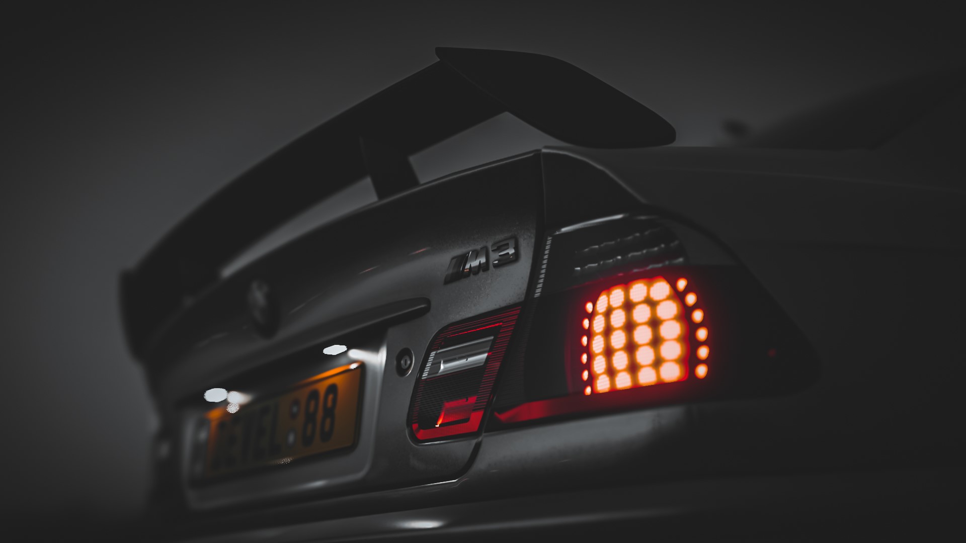 BMW M3 E46 with spoiler and custom license plate HD Wallpaper
