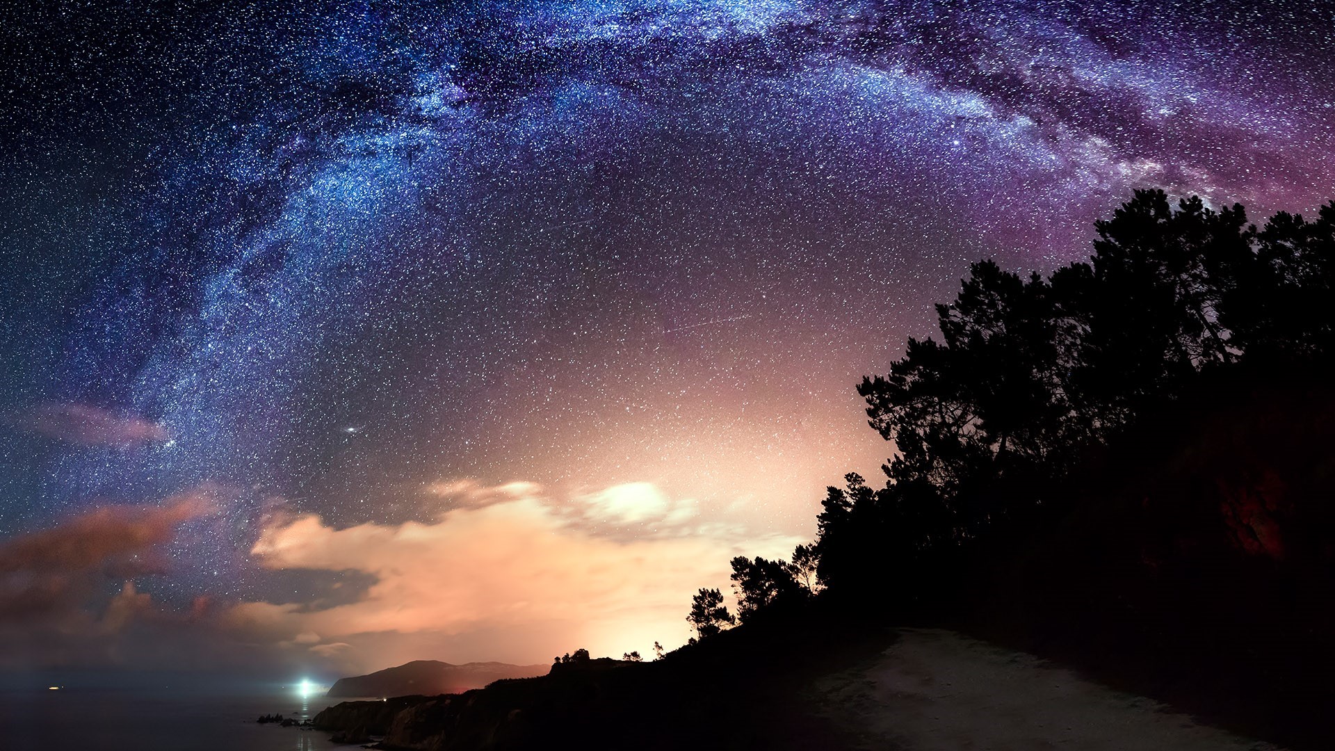 Milky Way over the coast of Galicia, Spain at night HD Wallpaper