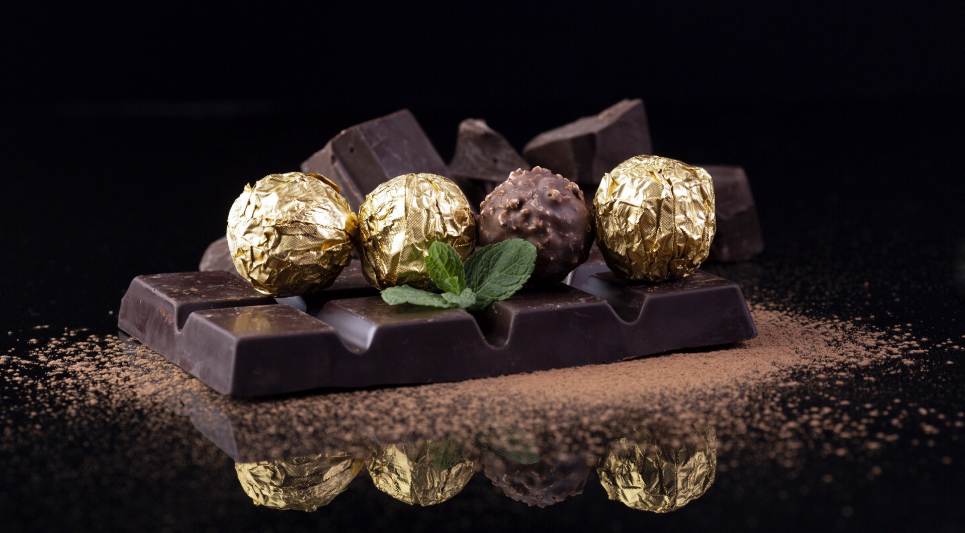Ferrero Rocher chocolates and dark chocolate bar with mint HD Wallpaper