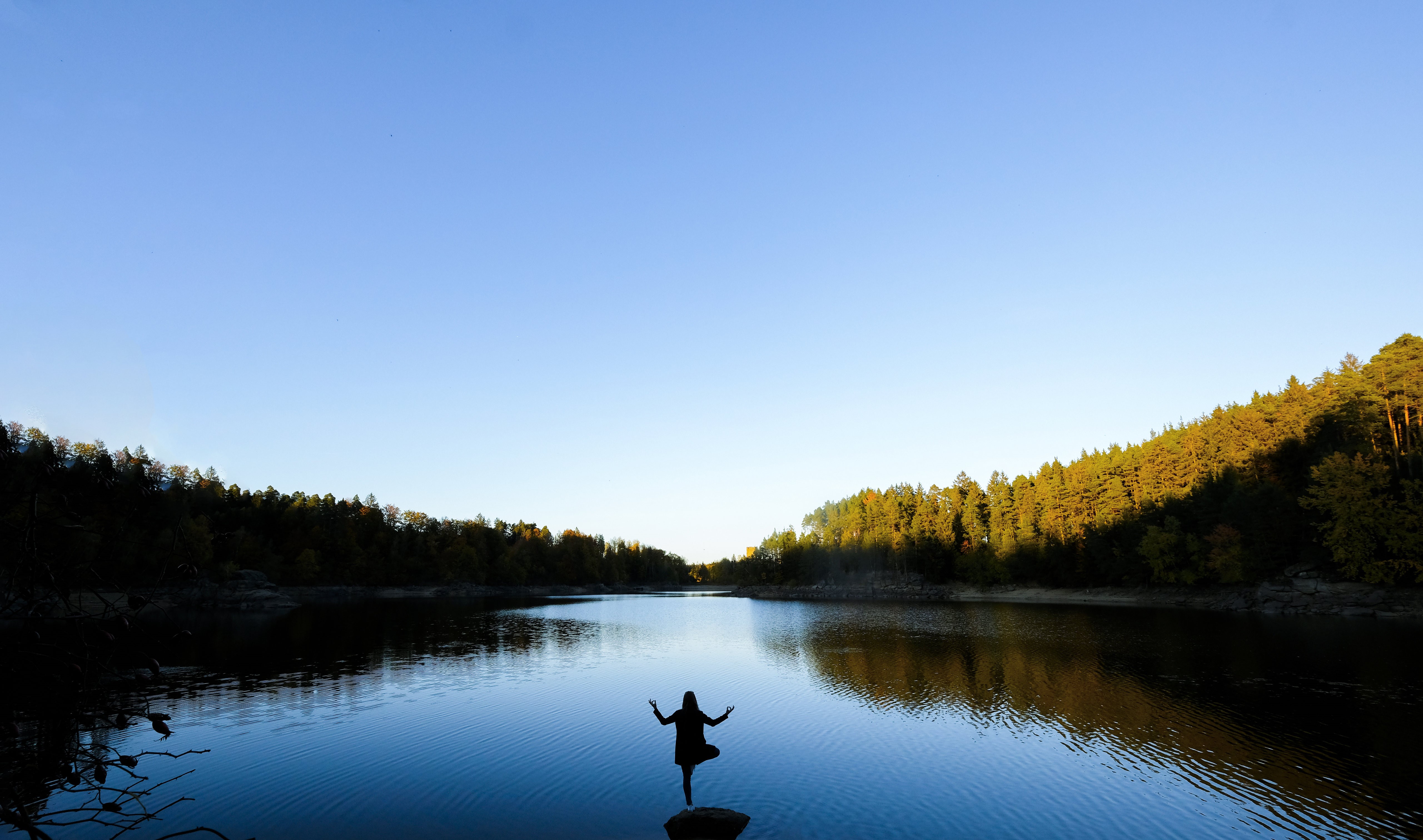Woman doing yoga by Ottenstein Reservoir HD Wallpaper