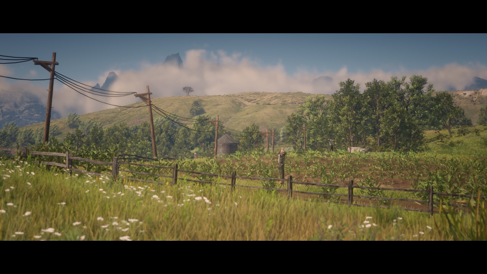 Red Dead Redemption 2 landscape with farm and mountains HD Wallpaper