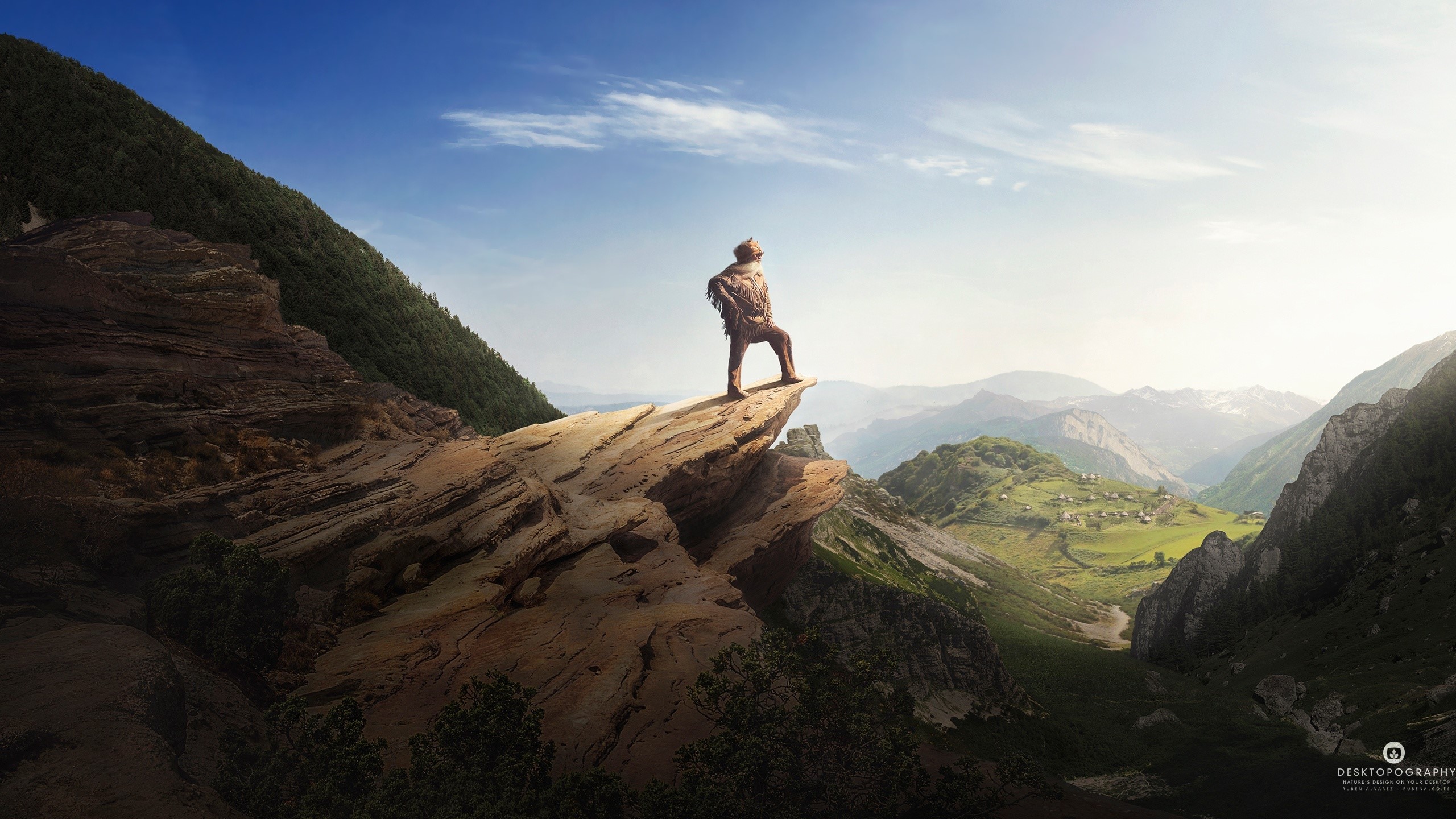 Man standing on a rocky cliff overlooking mountains HD Wallpaper