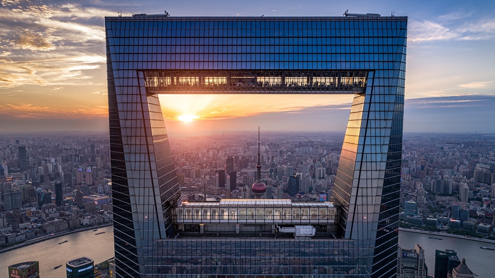 Shanghai cityscape with skyscrapers and river at sunset HD Wallpaper