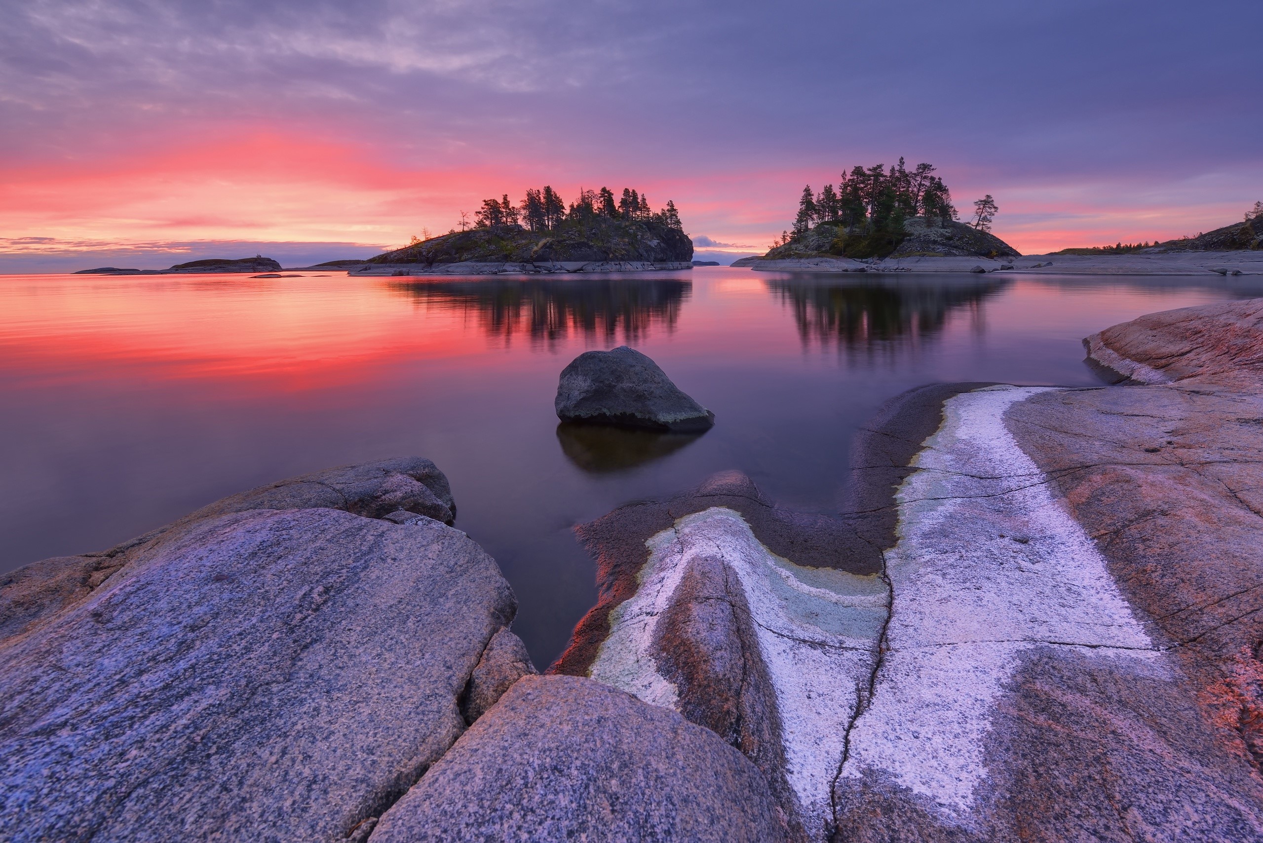 Sunset over a rocky lake with islands in Russia HD Wallpaper