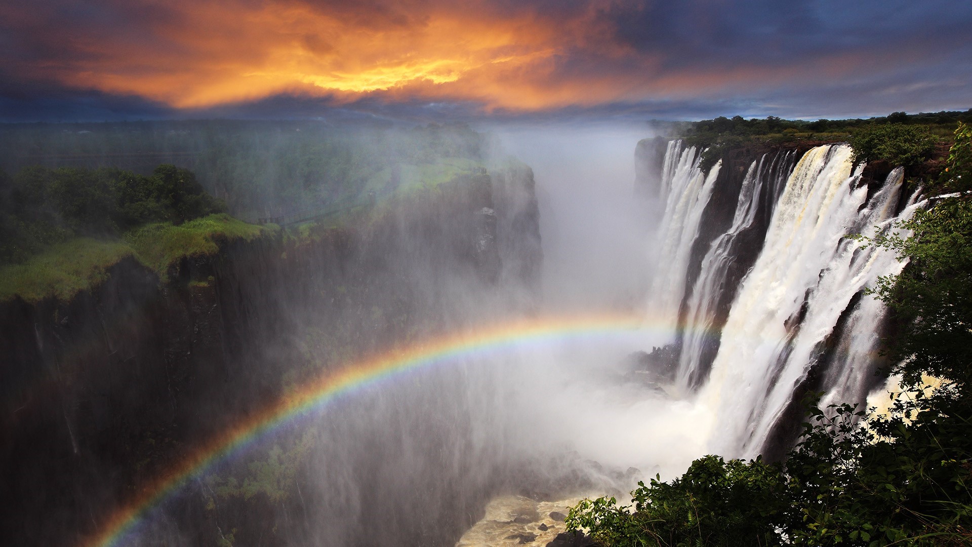 Victoria Falls, Zambia at Sunset with Rainbow HD Wallpaper