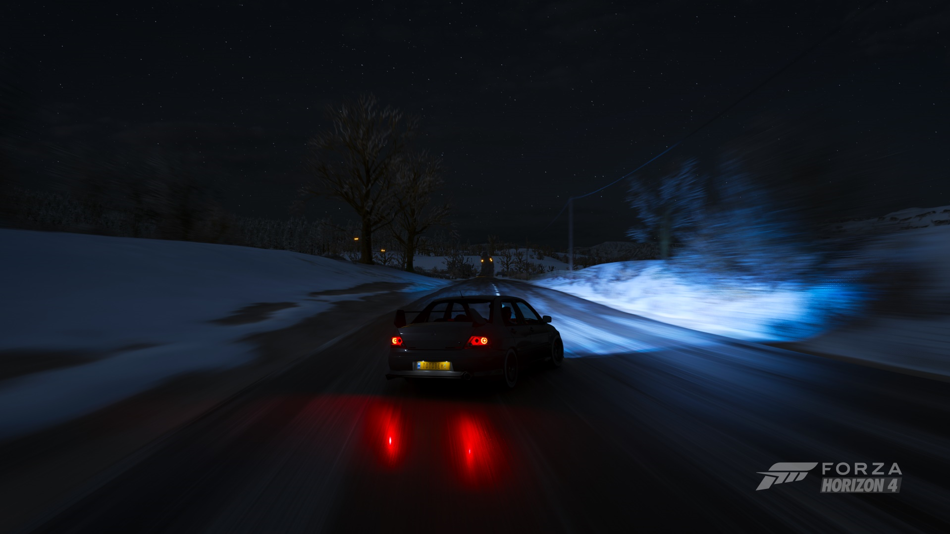 Mitsubishi Lancer Evolution VIII driving in snow at night HD Wallpaper