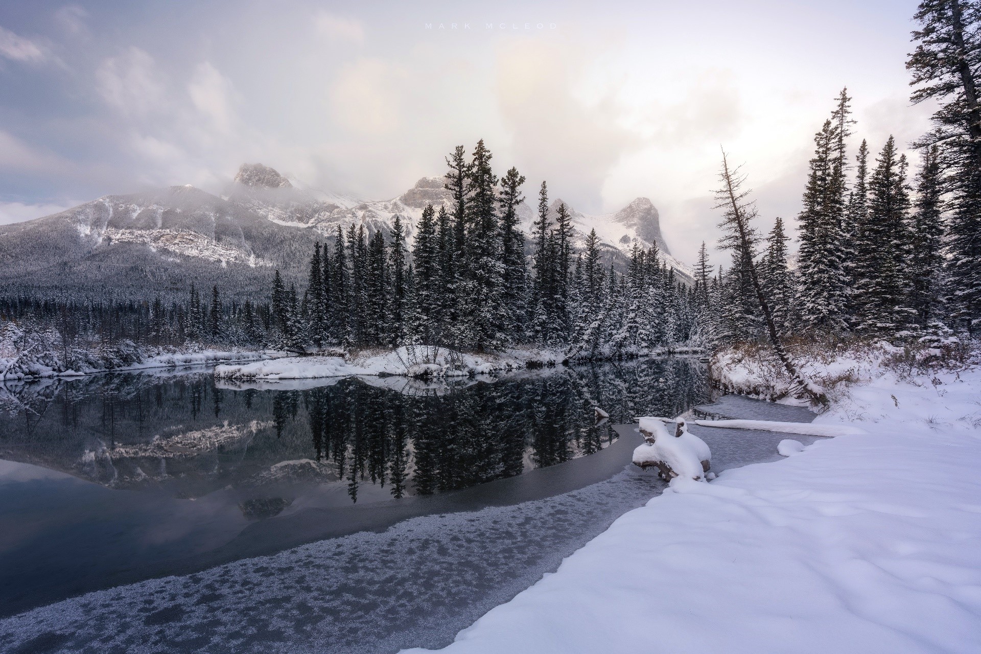 Snowy Mountains and Forest Reflected in a Winter River HD Wallpaper
